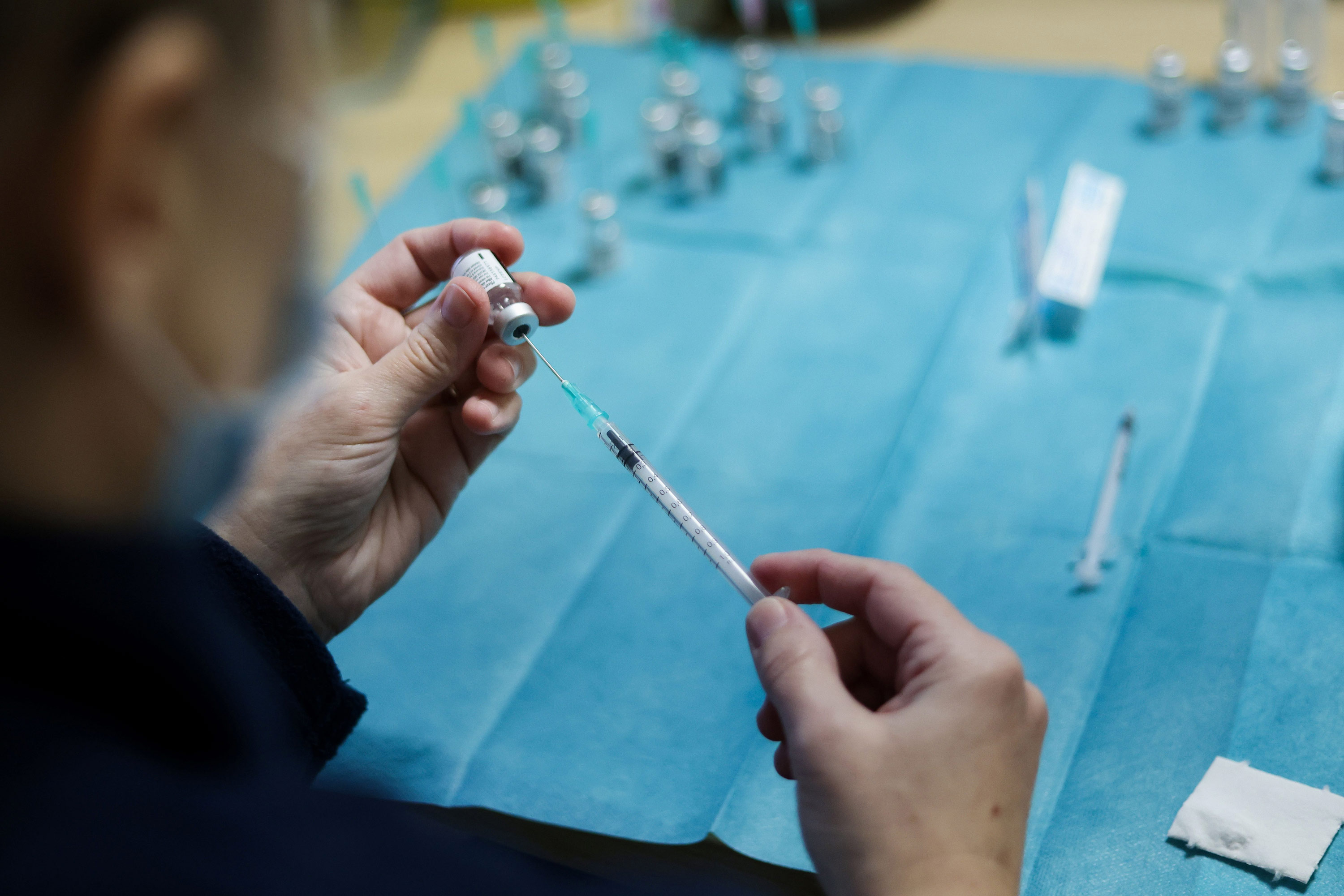 A nurse at the Christalain nursing home in Brussels prepares an injection of Pfizer-BioNTech Covid-19 vaccine on January 14.