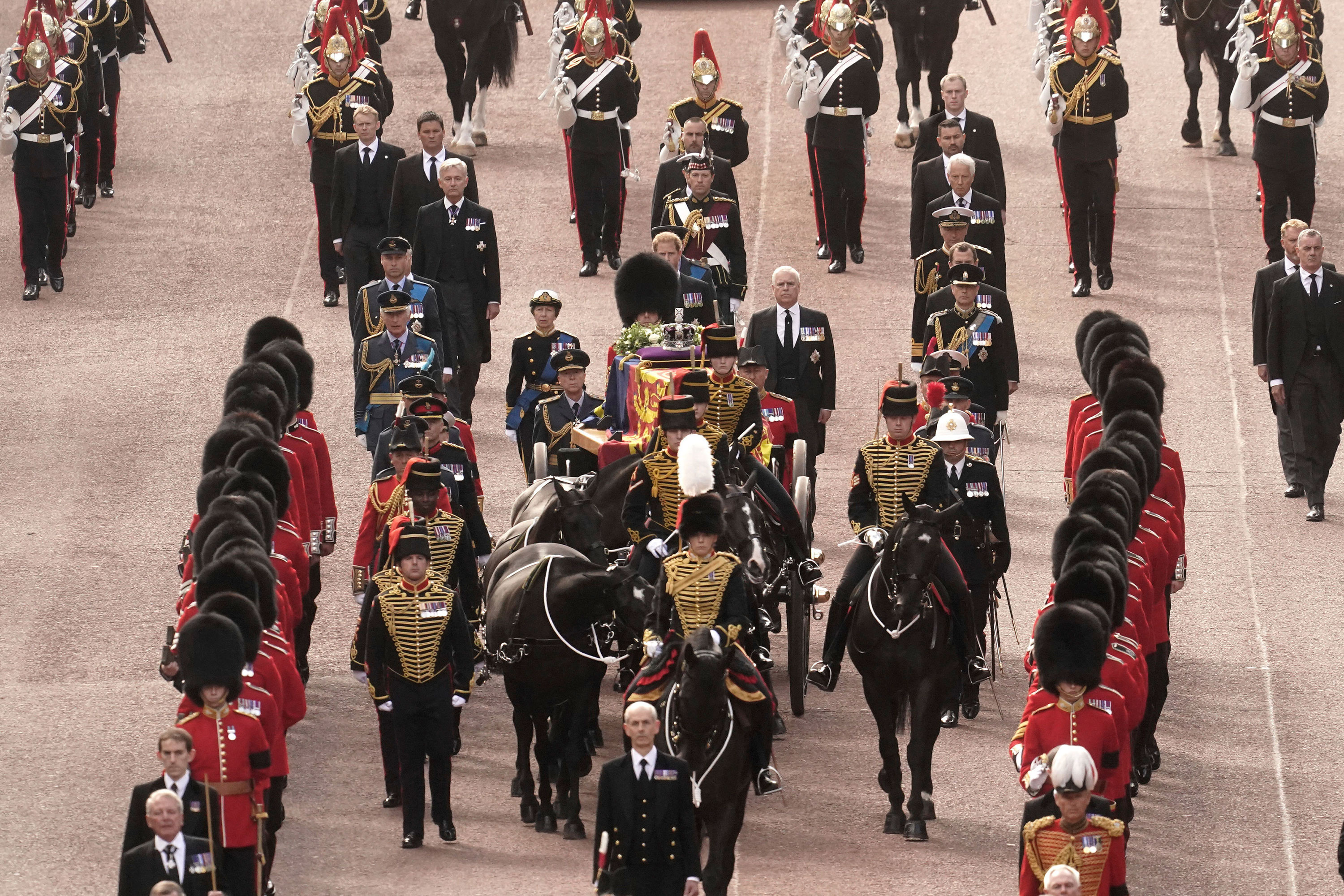 The coffin of Queen Elizabeth II is carried on a horse-drawn gun carriage of the King's Troop Royal Horse Artillery on Wednesday.
