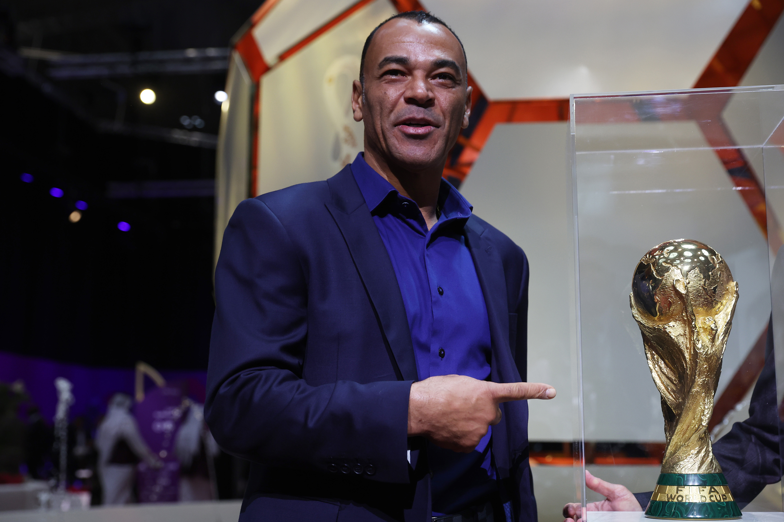 Brazil‘s football legend Cafu poses for a photo with the FIFA World Cup Trophy ahead of the 72nd FIFA Congress at the Doha Exhibition and Convention Center on March 31 in Doha, Qatar. 