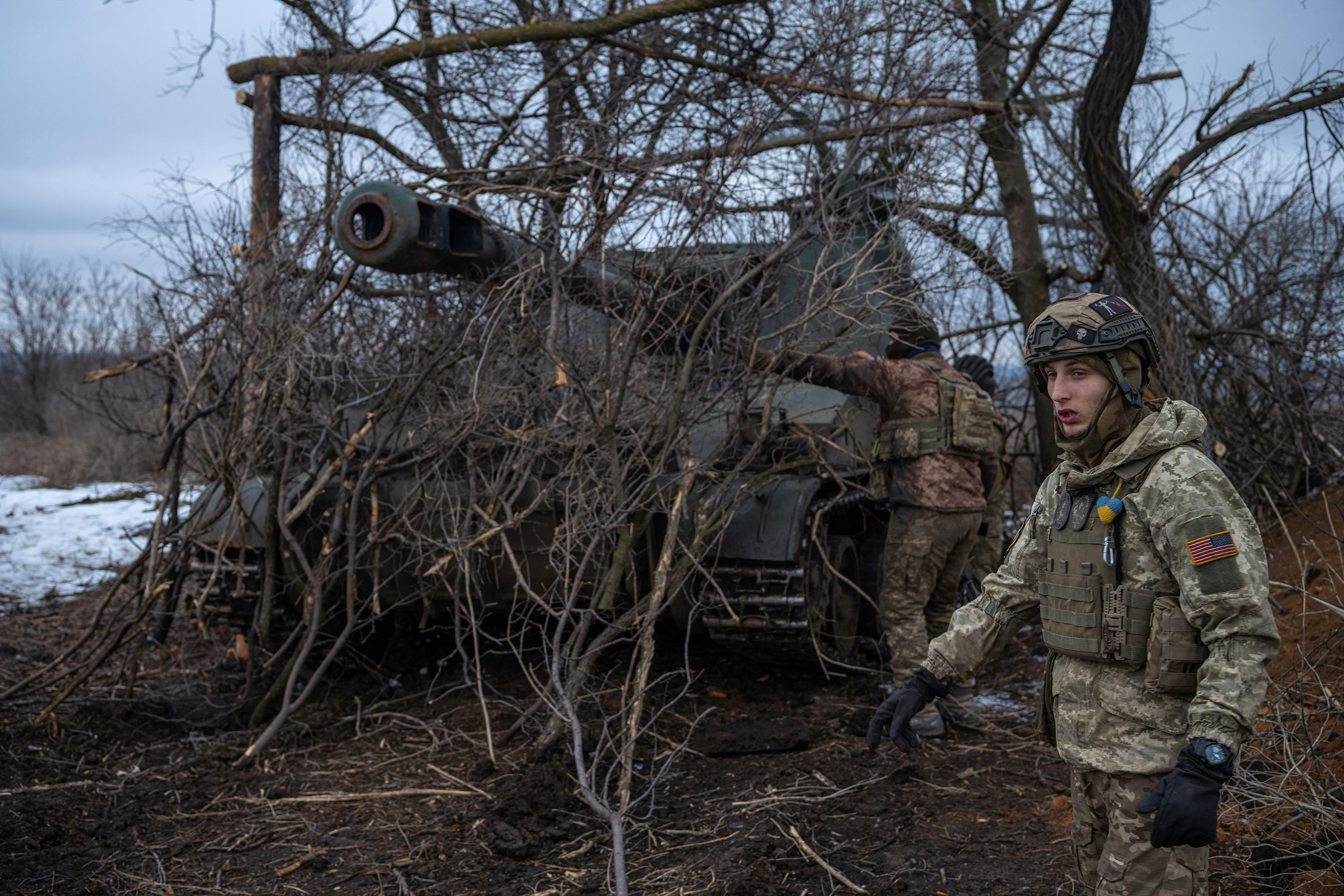 Ukrainian servicemen prepare to fire a howitzer near Bakhmut on February 25. 