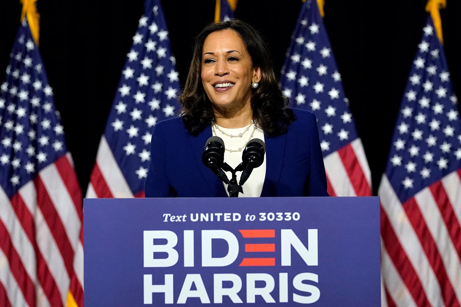 Sen. Kamala Harris, D-Calif., speaks after Democratic presidential candidate former Vice President Joe Biden introduced her as his running mate during a campaign event at Alexis Dupont High School in Wilmington, Del., Wednesday, Aug. 12.