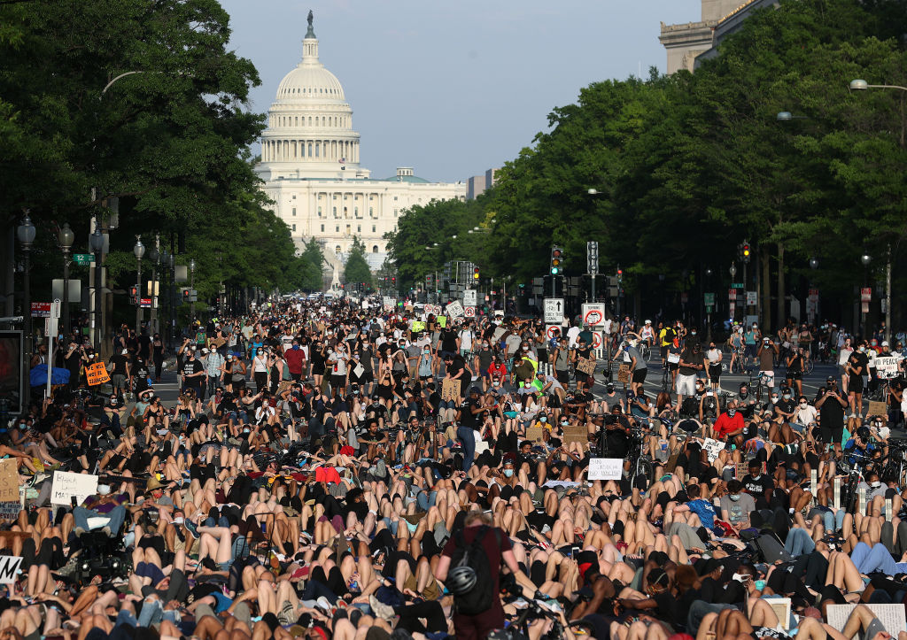 Demonstrators lay down on Pennsylvania Avenue during a peaceful protest against police brutality and the death of George Floyd on June 3.