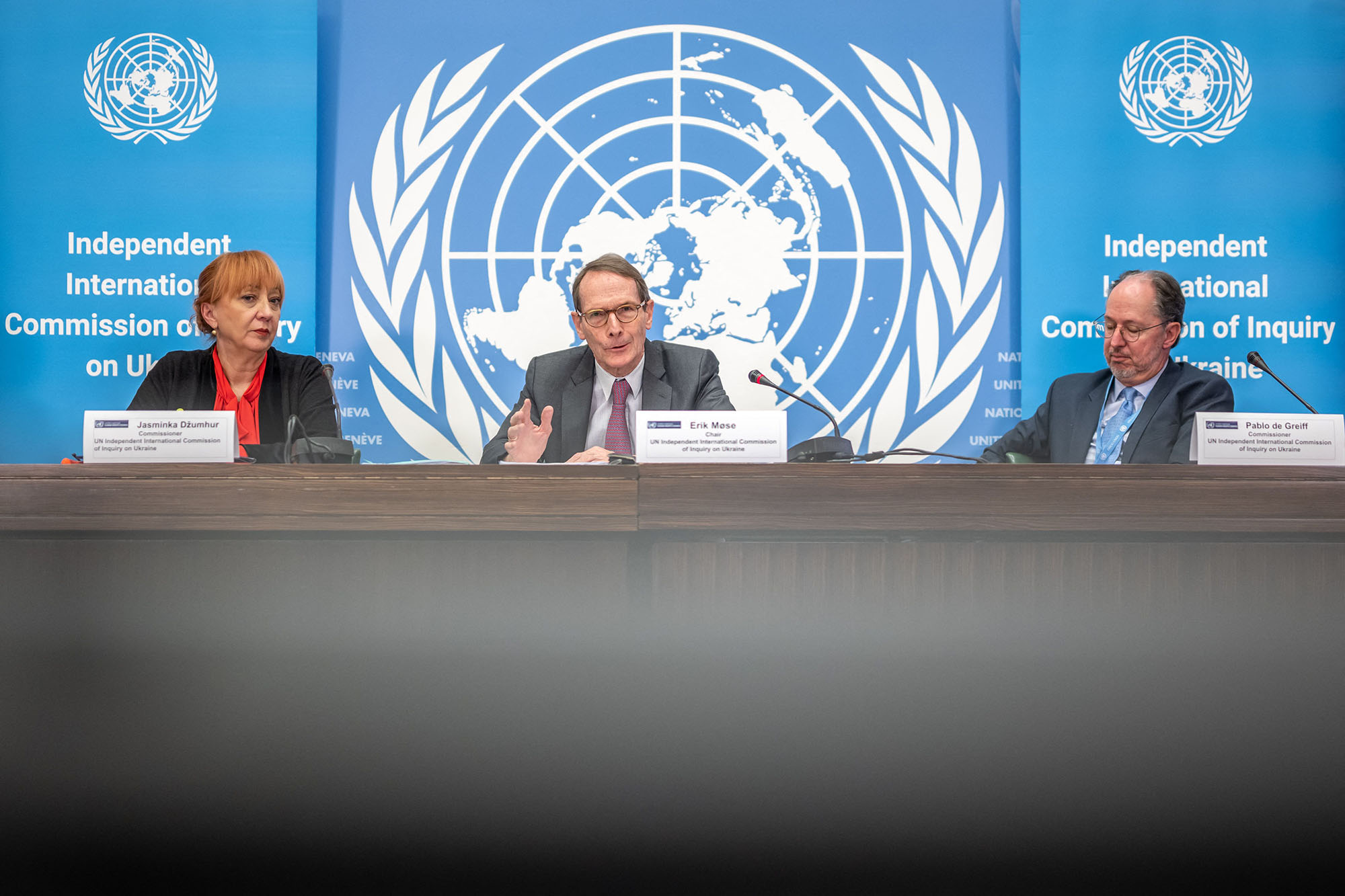 Chair of the Independent international commission of inquiry on Ukraine Erik Mose, center, and Commission's members Jasminka Dzumhur, left, and Pablo de Greiff attend a news conference to present the report containing their latest findings in Geneva, Switzerland, on March 16. 