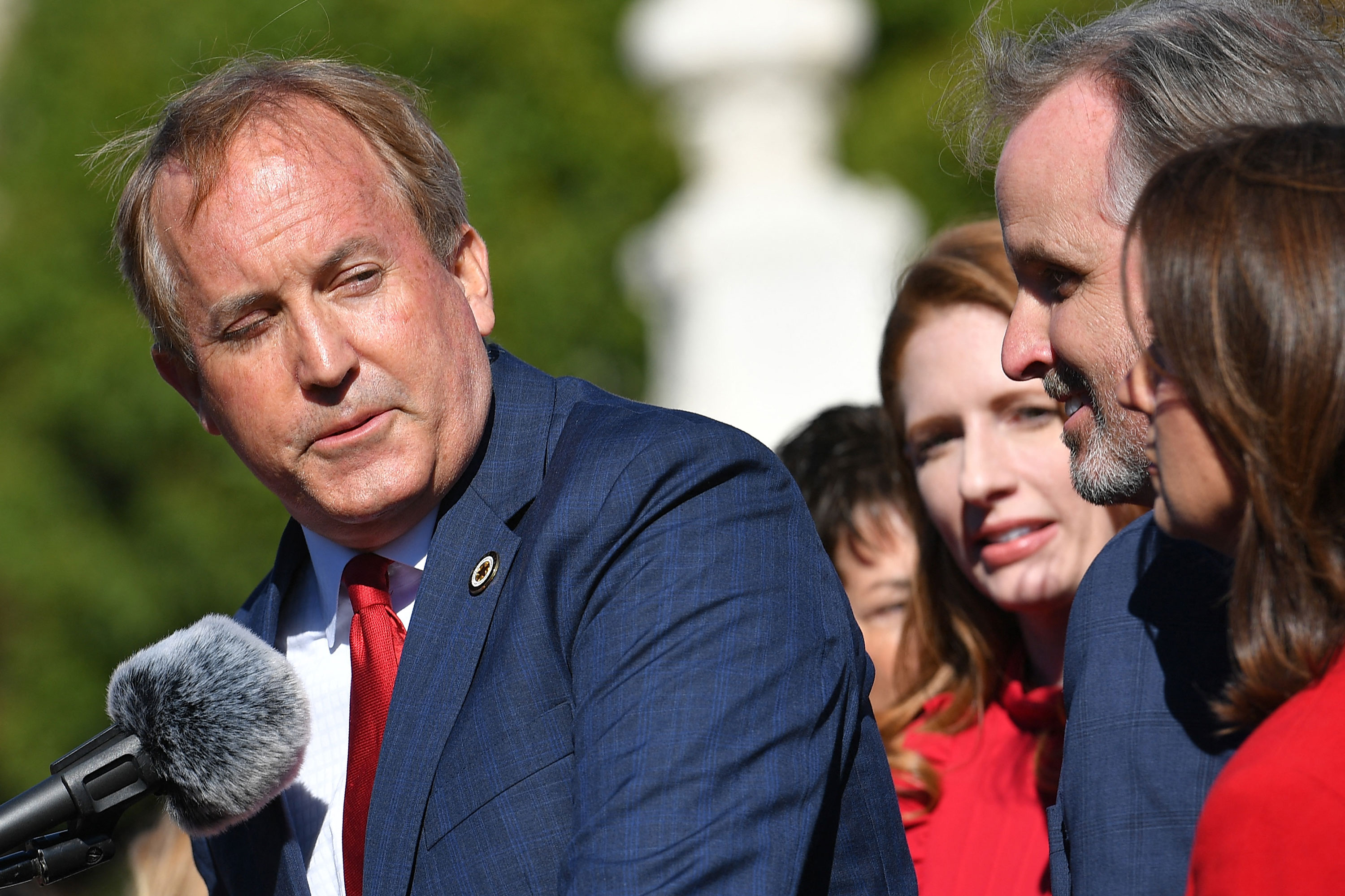 Texas Attorney General Ken Paxton speaks outside of the US Supreme Court in Washington, DC, in November.