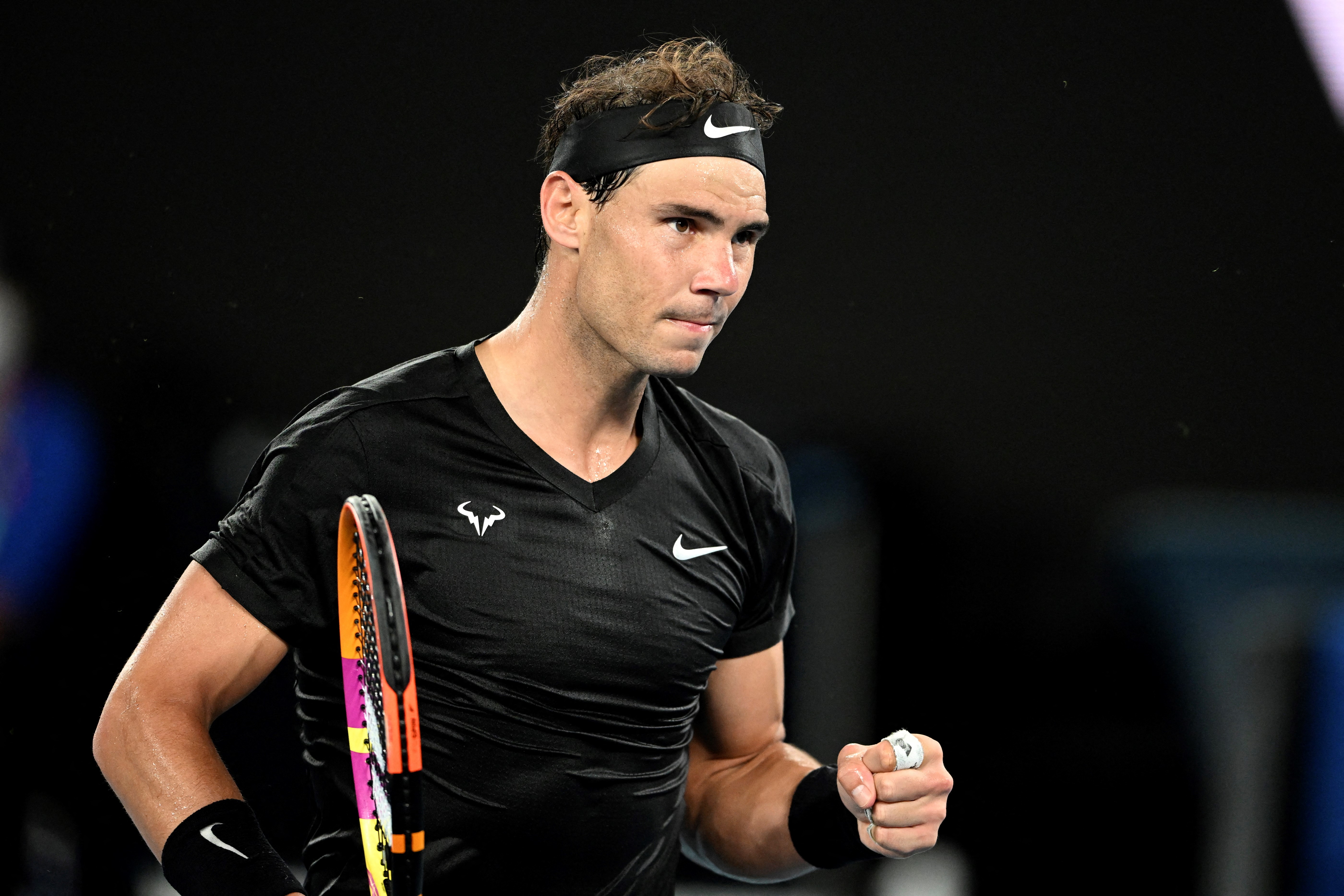 Rafael Nadal of Spain reacts on point during his men's singles match against Ricardas Berankis of Lithuania at the Melbourne Summer Set tennis tournament in Melbourne on January 6, 2022.