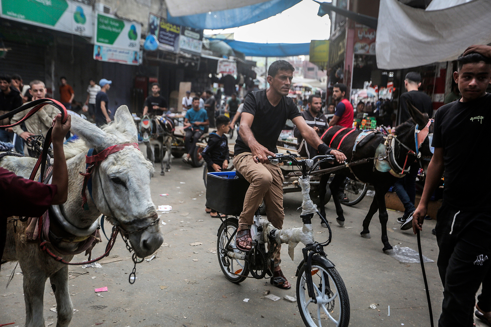 Palestinians use alternative forms of transportation amid fuel shortages in Khan Younis, Gaza, on October 28. 