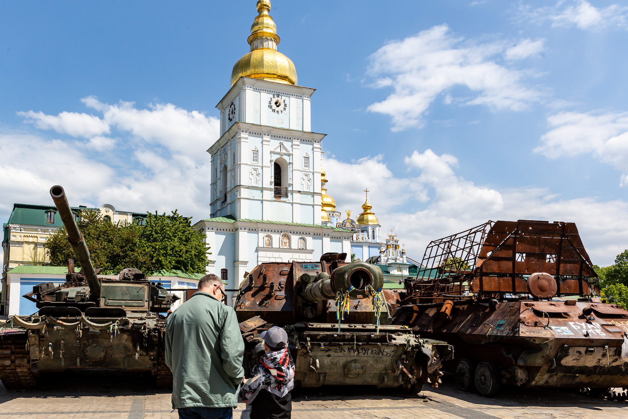People visit an exhibition of burnt Russian tanks on Mykhailivs'ka Square in Kyiv on Thursday.