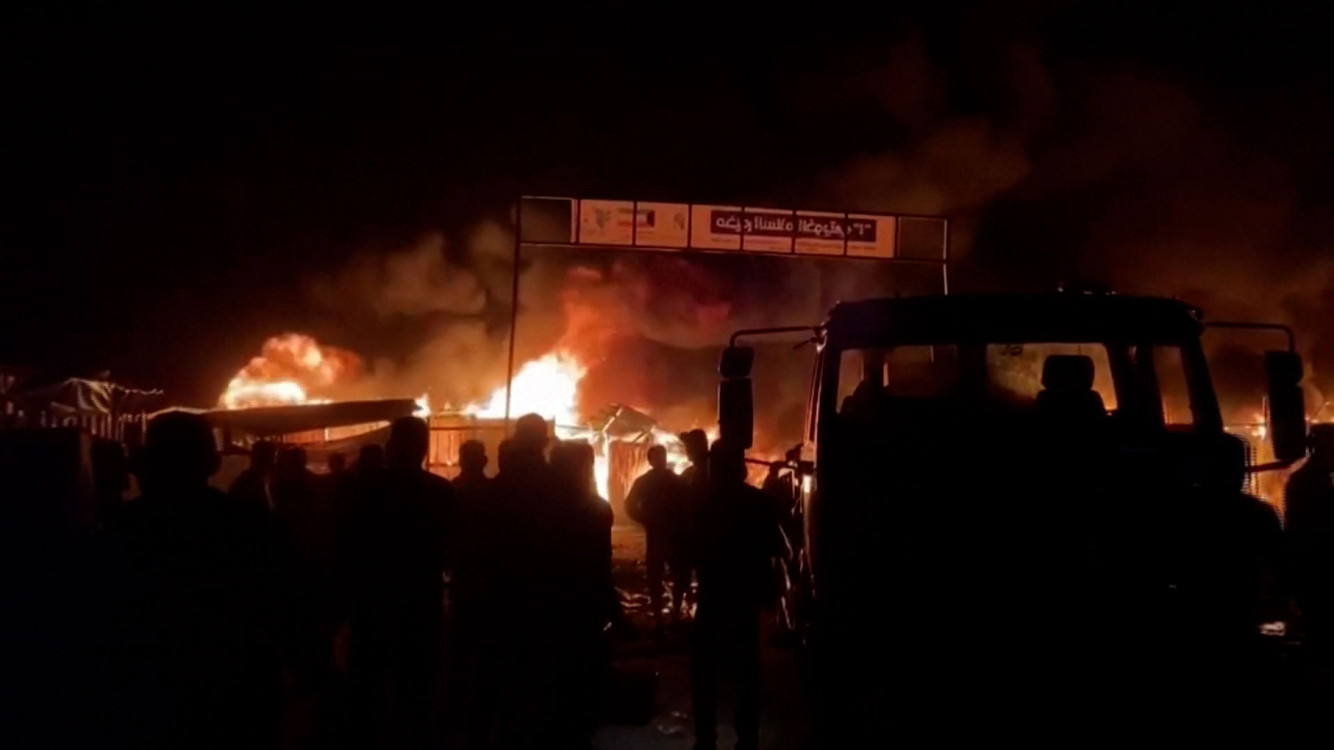 In this video still, fire rages following an Israeli strike on an area designated for displaced Palestinians in Rafah, Gaza, on May 26. 