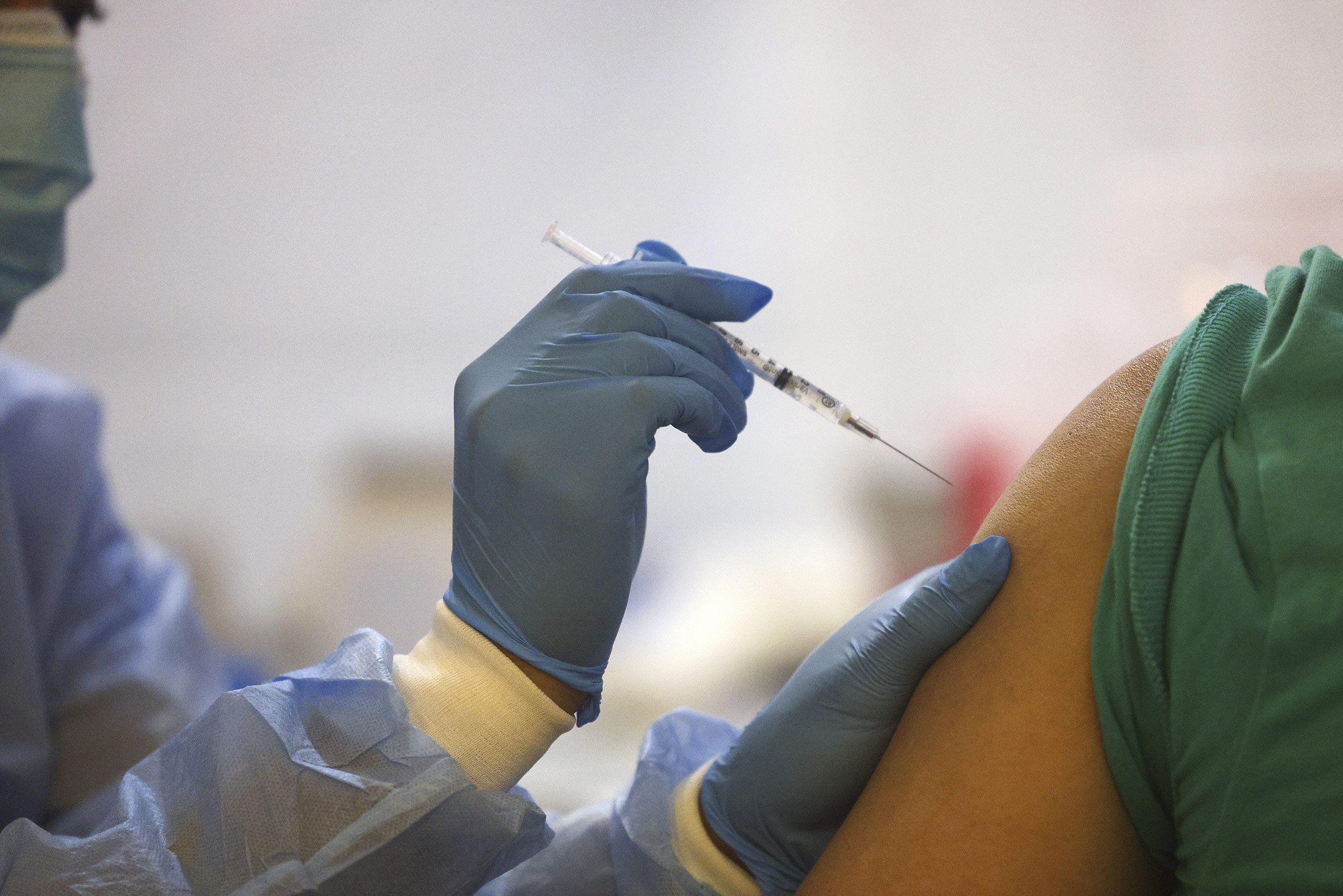 A healthcare worker administers a Covid-19 vaccine at a vaccination site in New York, on February 5. 