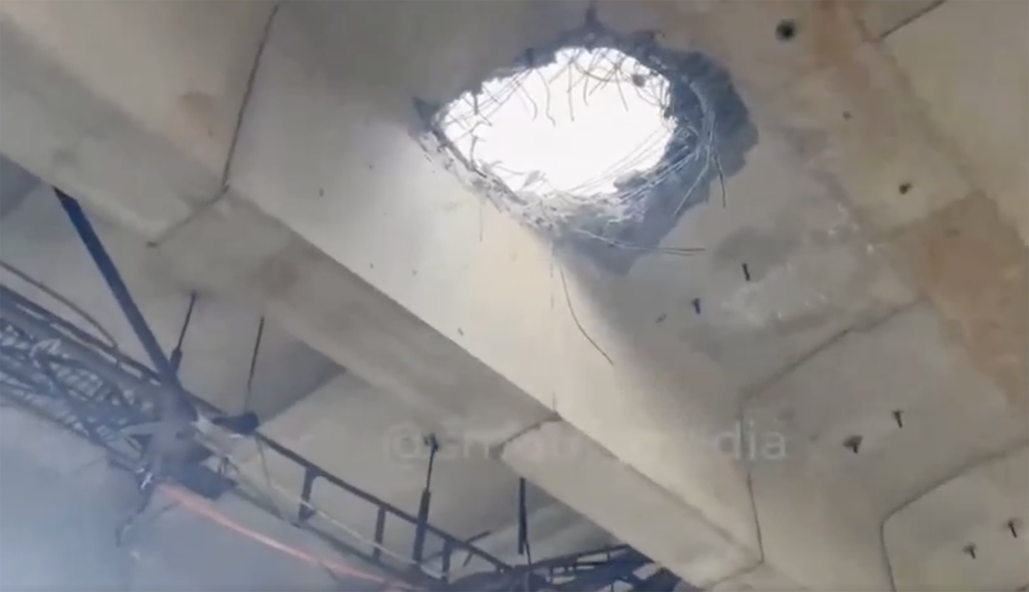 The Antonovskiy bridge to the largely Russian-occupied Kherson region in southern Ukraine has been shelled by Ukrainian forces, seen in this video grab released July 19.
