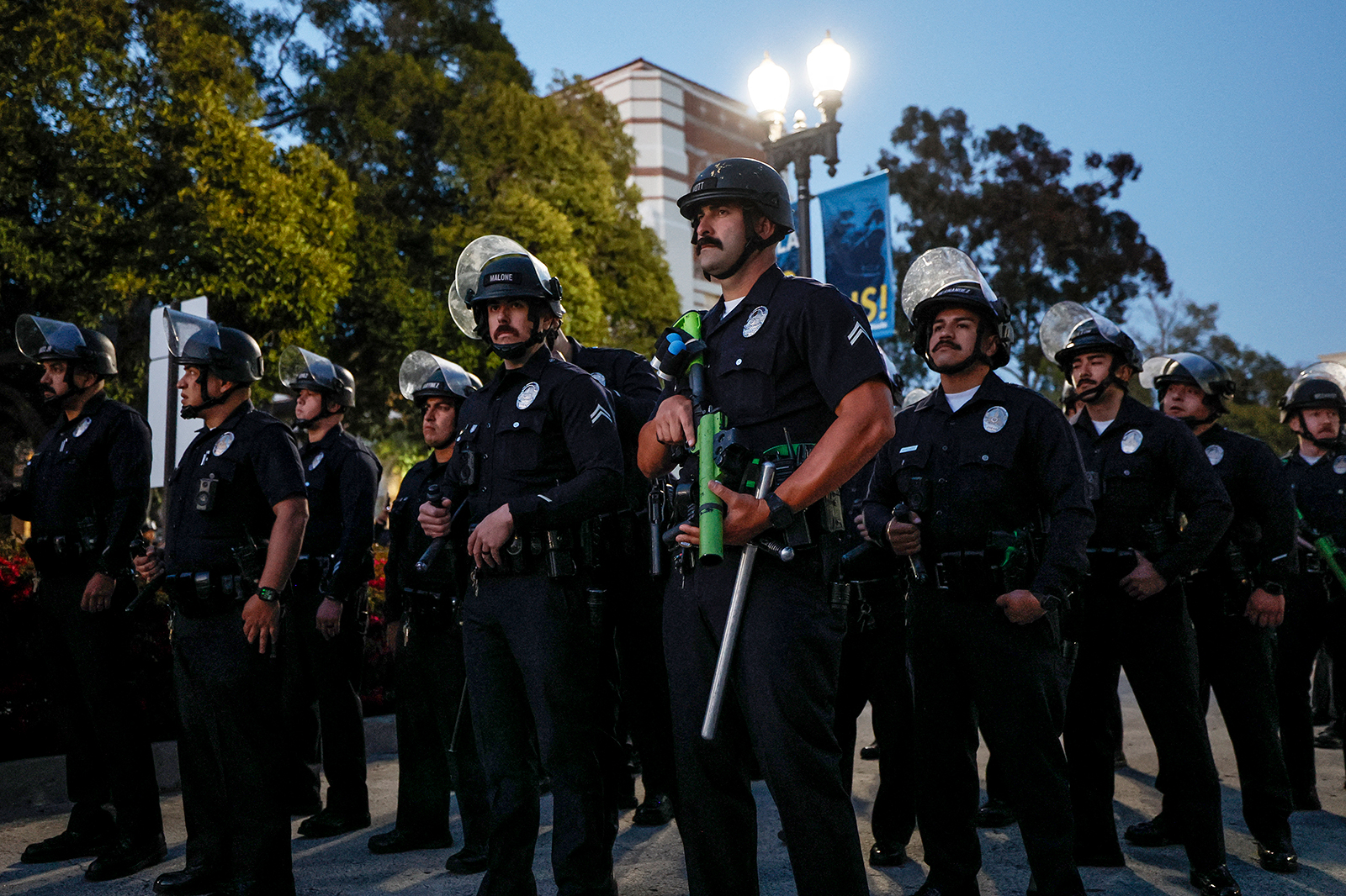 Police officers get into position as pro-Palestinian students and activists demonstrate on the campus of the University of California, Los Angeles (UCLA) on May 1.