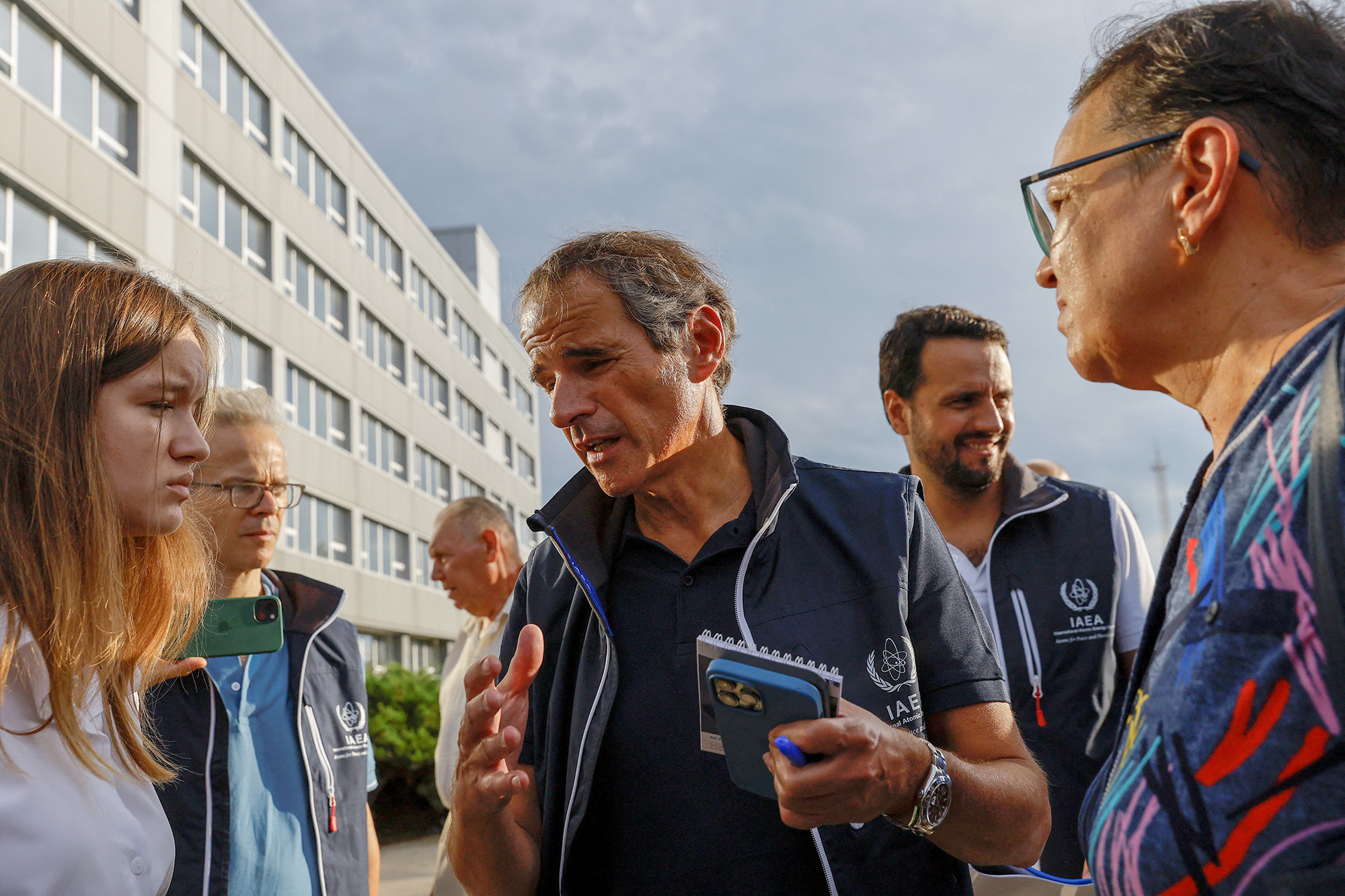 Members of the International Atomic Energy Agency (IAEA) expert mission, led by IAEA Director-General Rafael Grossi, center, meet with journalists at the Russian-controlled Zaporizhzhia nuclear power plant, Ukraine, on September 1.