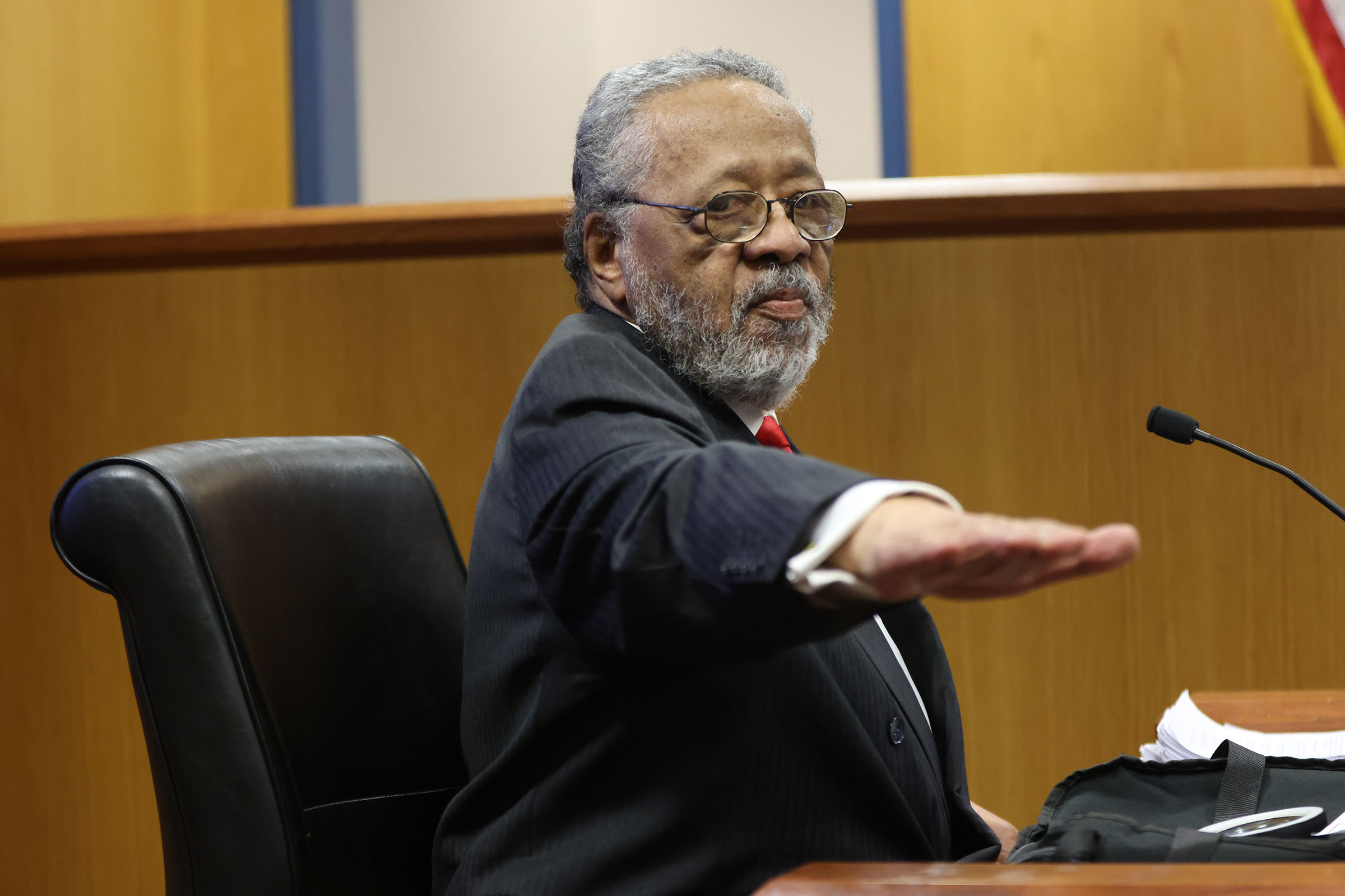 John Floyd gestures from the witness stand during a hearing in the case of the State of Georgia v. Donald John Trump at the Fulton County Courthouse on February 16, in Atlanta. 