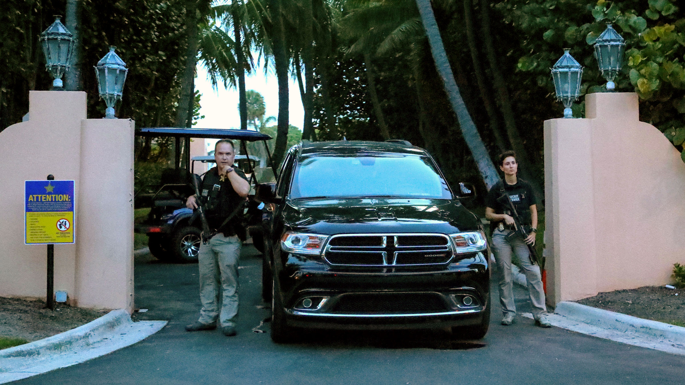 Secret Service agents stand at the gate of Mar-a-Lago after the FBI issued warrants at the Palm Beach, Florida, estate, in August 2022.
