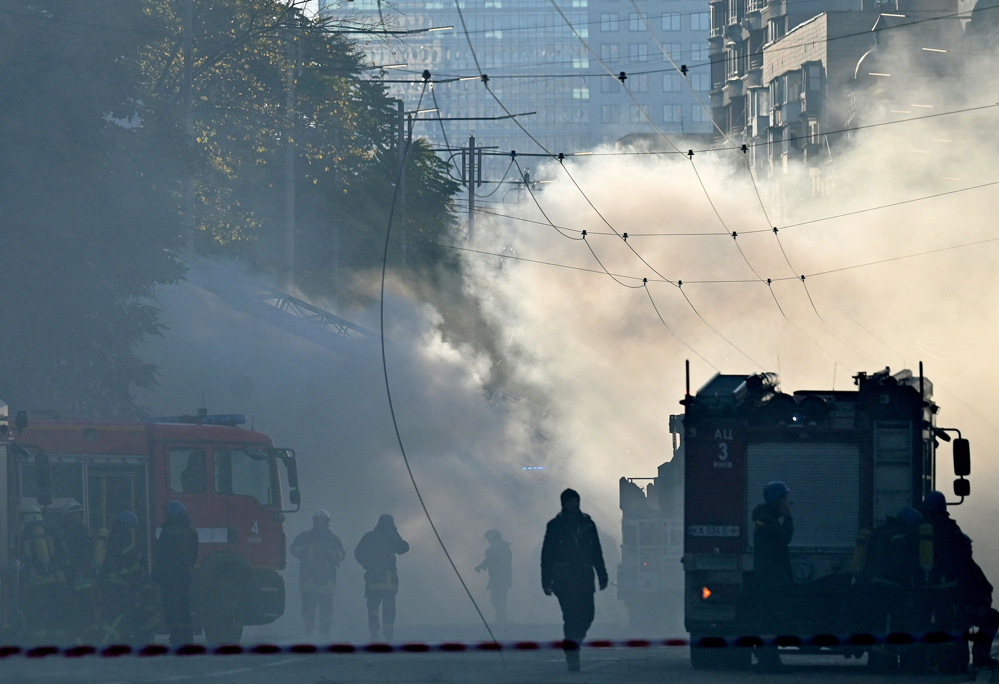 Smoke rises over the street after a drone attack in Kyiv, Ukraine, on October 17.