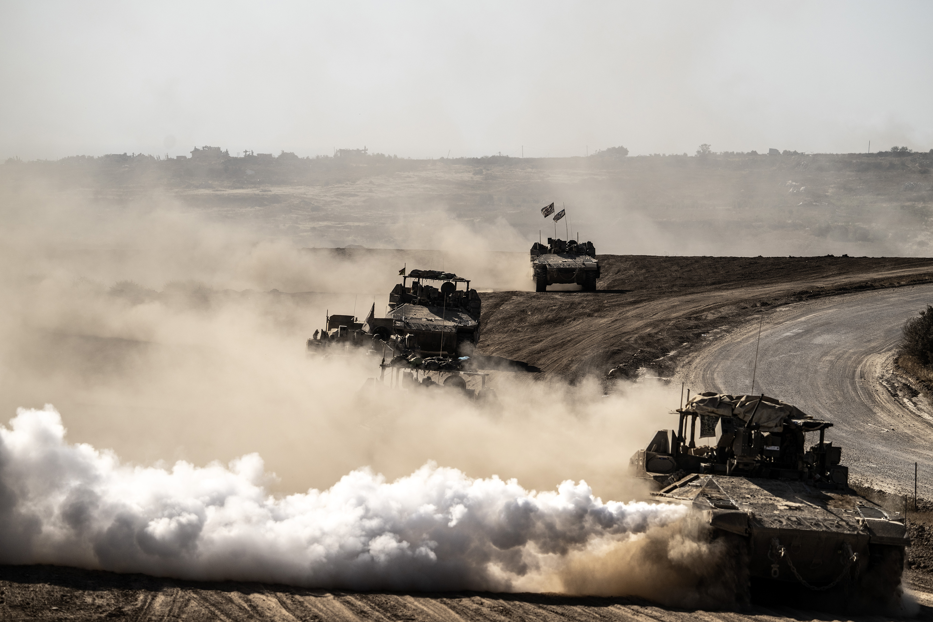 Israeli army's vehicles withdraw from the central Gaza on April 17.