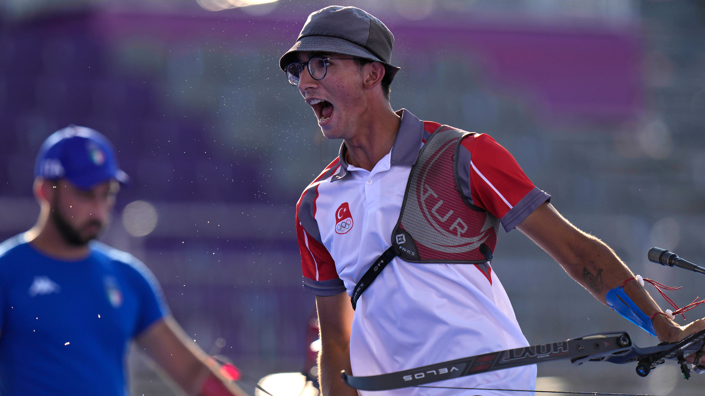 Turkey's Mete Gazoz celebrates after winning the individual archery final on July 31.