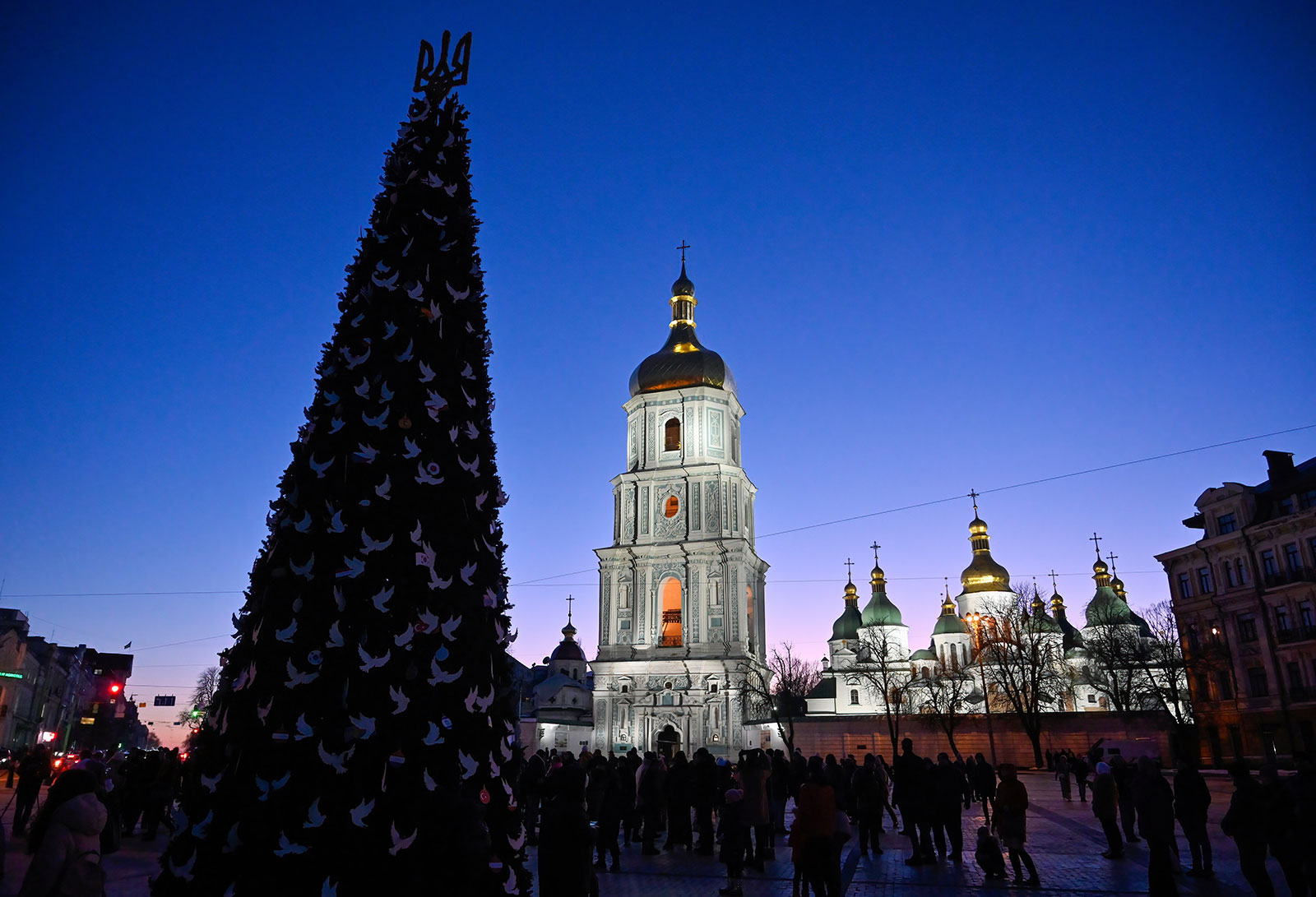 The Christmas tree at Sofiivska Square near St. Sophia cathedral is seen during a blackout in Kyiv on December 19. 
