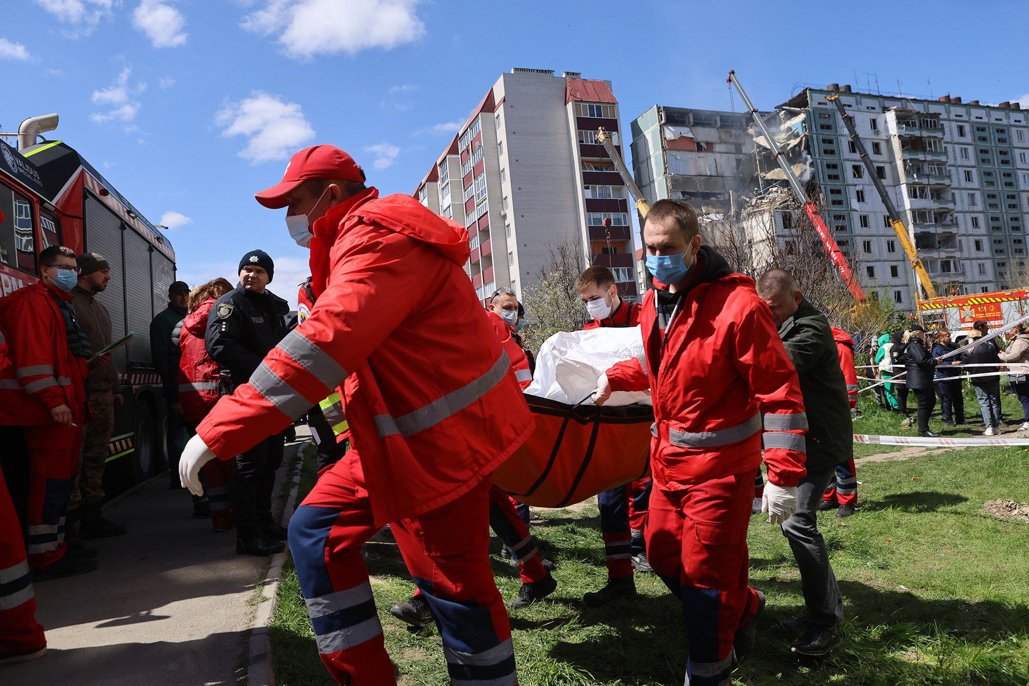 Medics transport a stretcher carrying a body bag in Uman, Ukraine, on April 28.