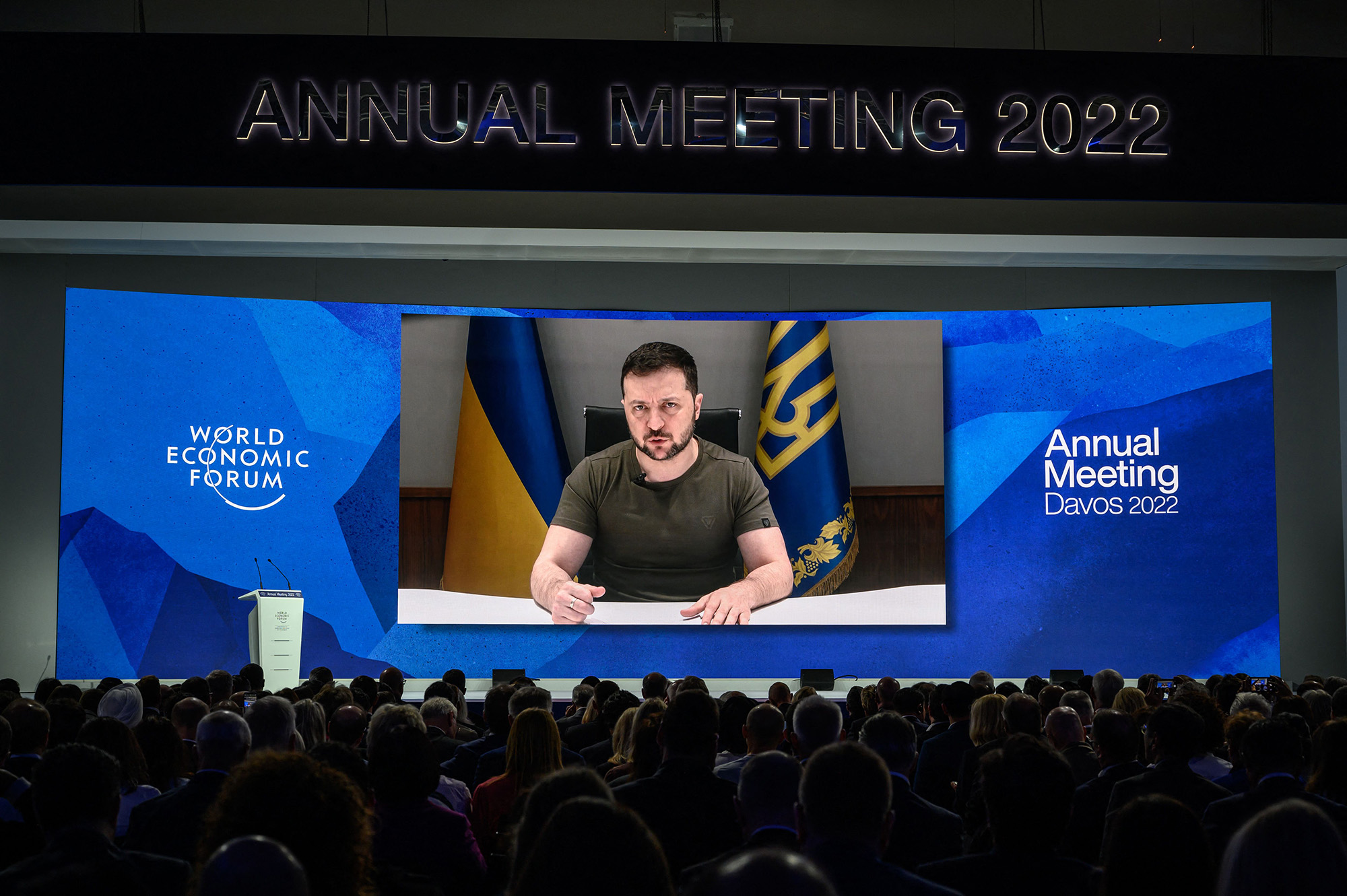 Ukrainian President Volodymyr Zelensky seen on a giant screen by video link delivering remarks at the Congress centre during the World Economic Forum (WEF) annual meeting in Davos, Switzerland, on May 23.