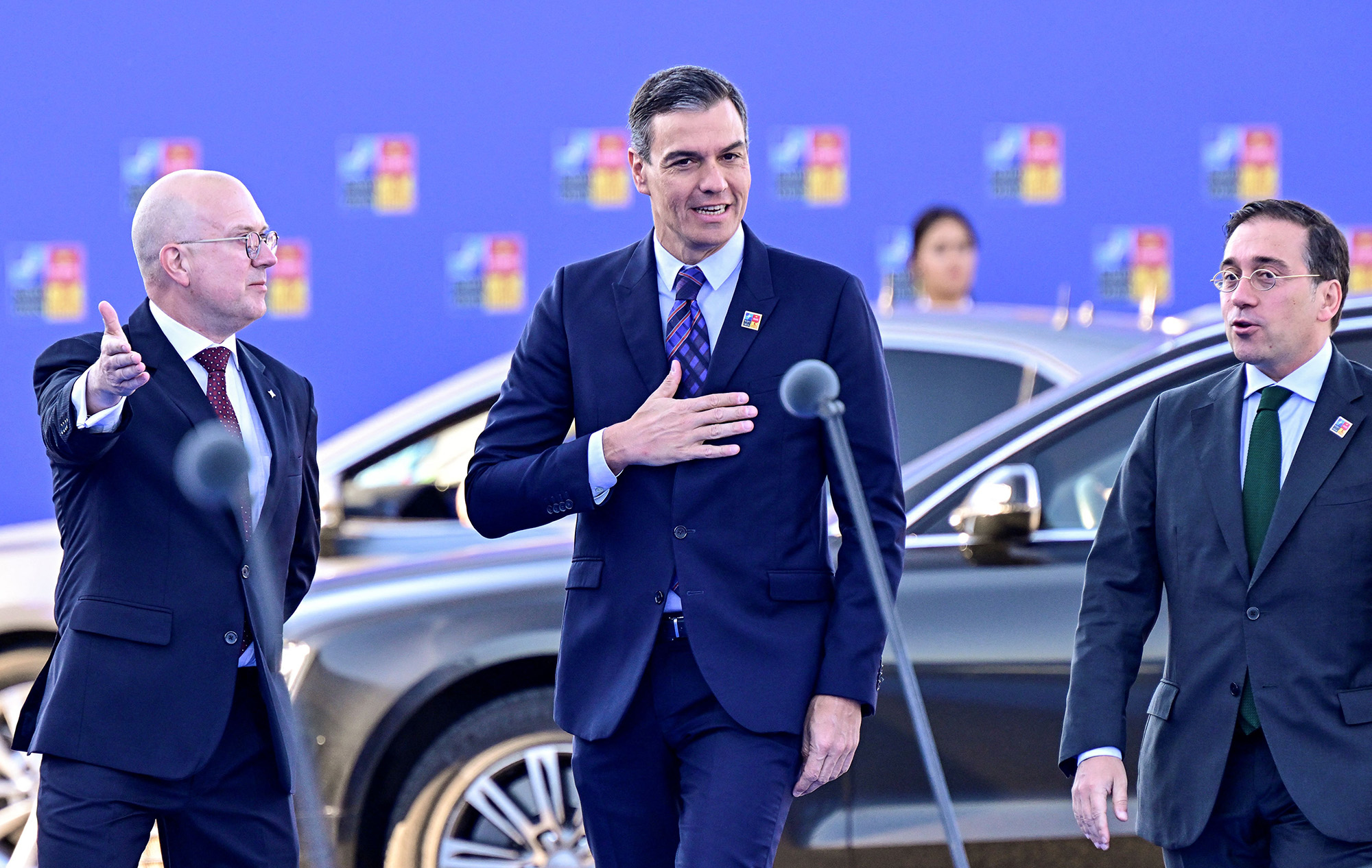 From left, NATO Secretary of the Council Jorgen Christian Jorgensen, Spain's Prime Minister Pedro Sanchez and Spain's Minister for Foreign Affairs Jose Manuel Albares arrive for the NATO summit at the Ifema congress centre in Madrid, Spain, on June 29.