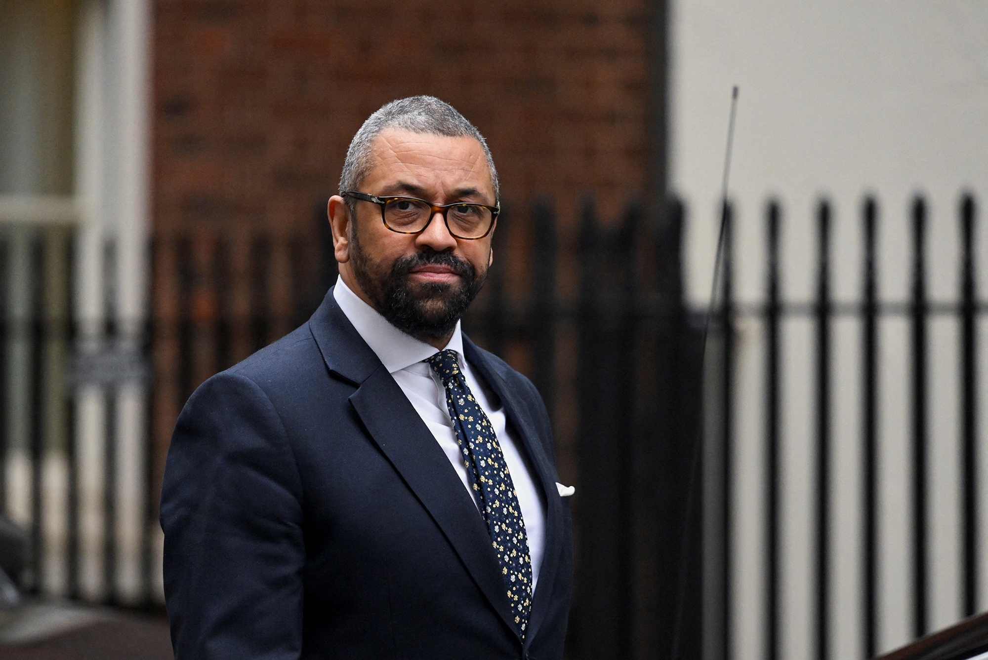 British Foreign Secretary James Cleverly walks outside Downing Street in London, England, on February 21.