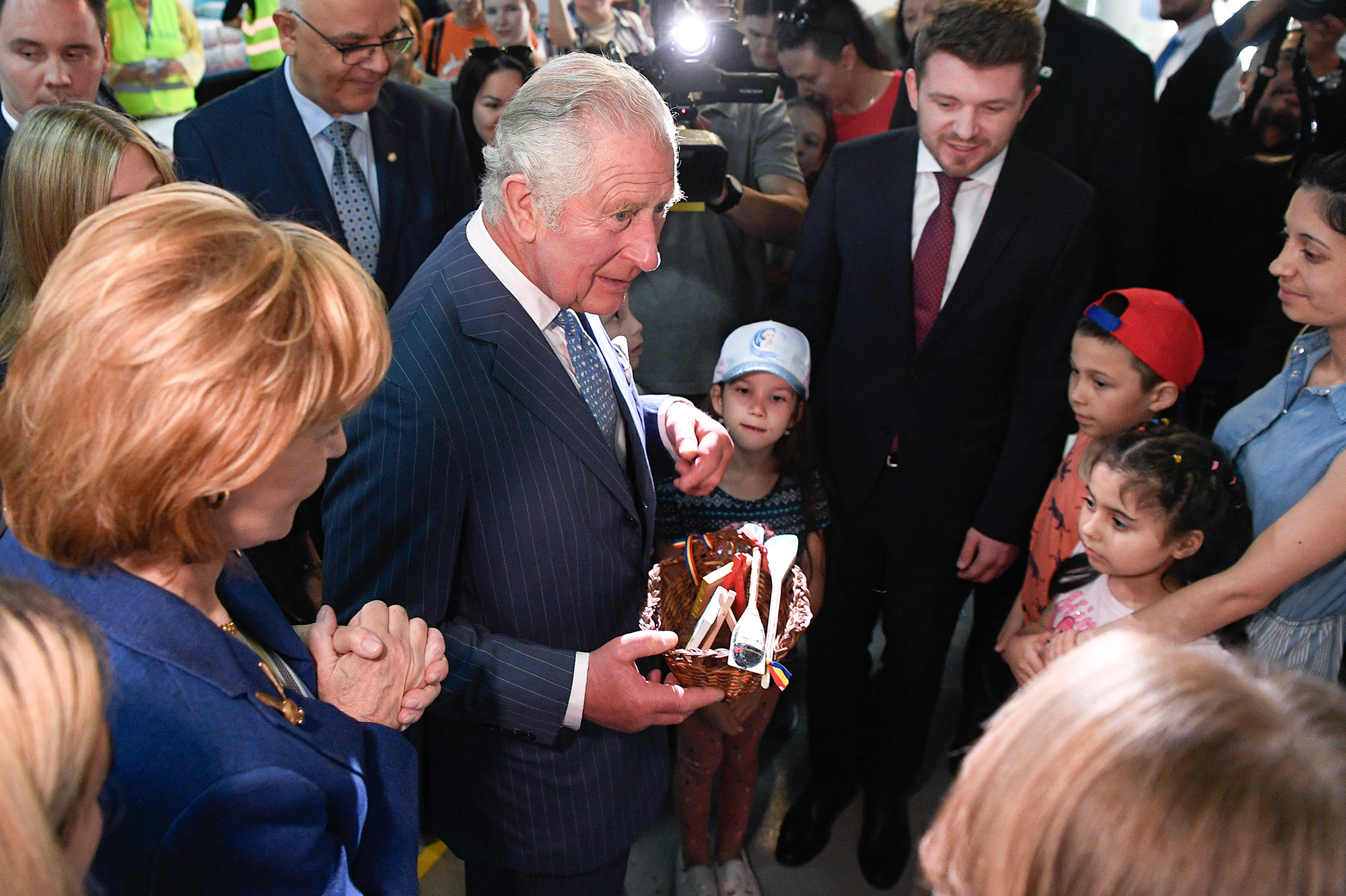 Prince Charles visits a Ukrainian refugee center in Bucharest, Romania on May 25. 