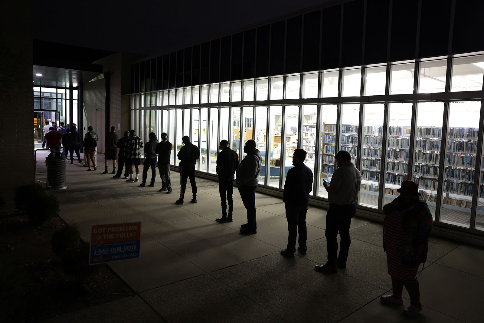 Residents wait in line to vote early outside a polling station on Tuesday, November 29, in Atlanta.