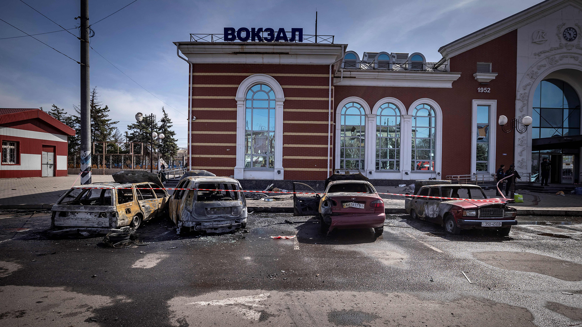 Damaged vehicles are seen outside a train station in Kramatorsk, Ukraine after it was hit by a rocket attack on Friday.