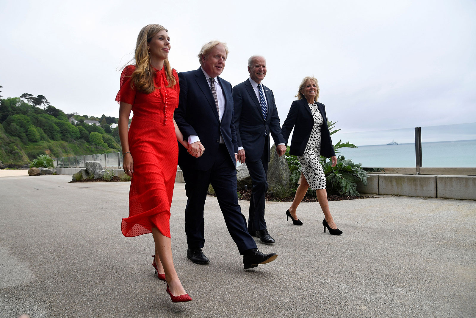 Britain's Prime Minister Boris Johnson, his wife Carrie Johnson and US President Joe Biden with first lady Jill Biden walk outside Carbis Bay, Cornwall, on Thursday, June 10.