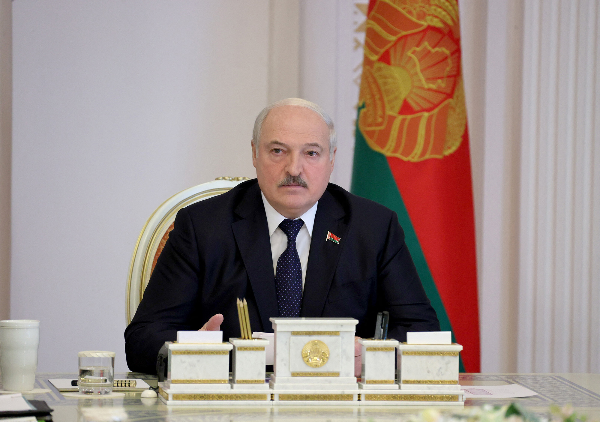 Belarus' President Alexander Lukashenko meets with military officials in Minsk, Belarus, on October 10.