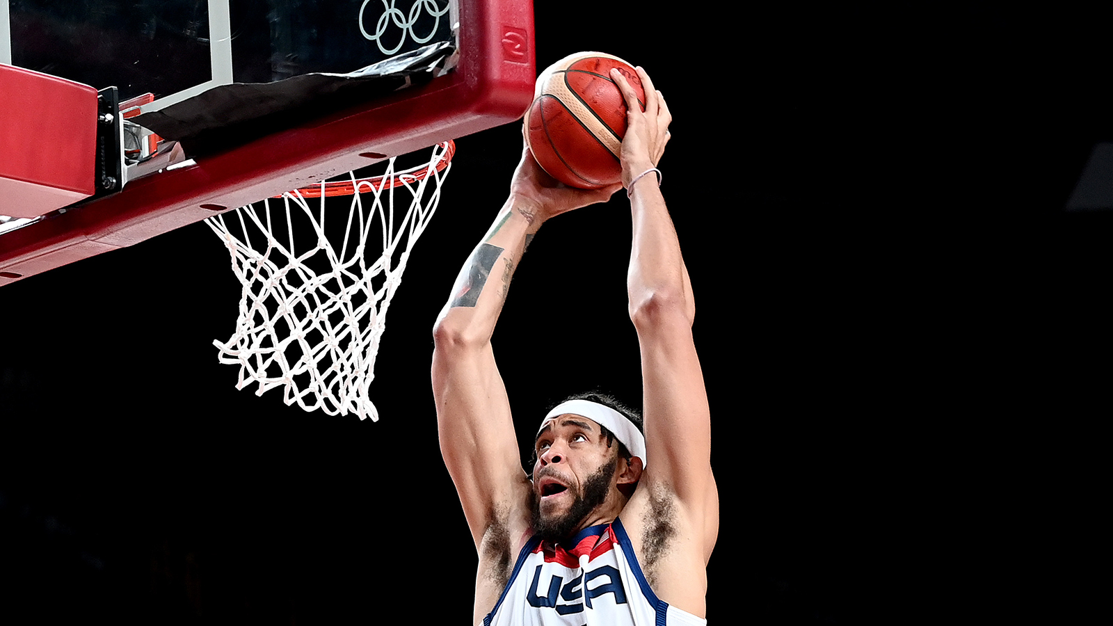 JaVale McGee dunks in Team USA's Olympic semifinal match against Australia on August 5.