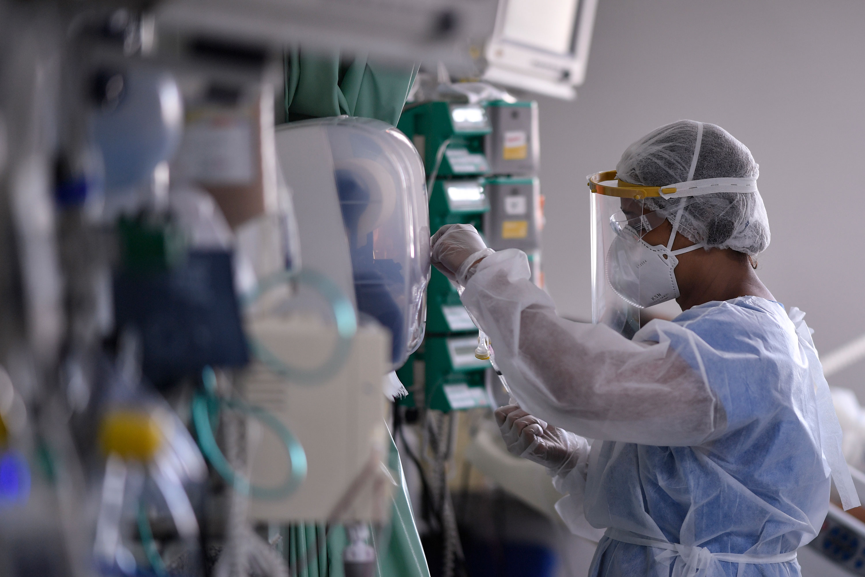 A health professional works in the intensive care unit ward, where patients infected with the COVID-19 are being treated, at the Santa Casa hospital in Belo Horizonte, Brazil, on June 1.