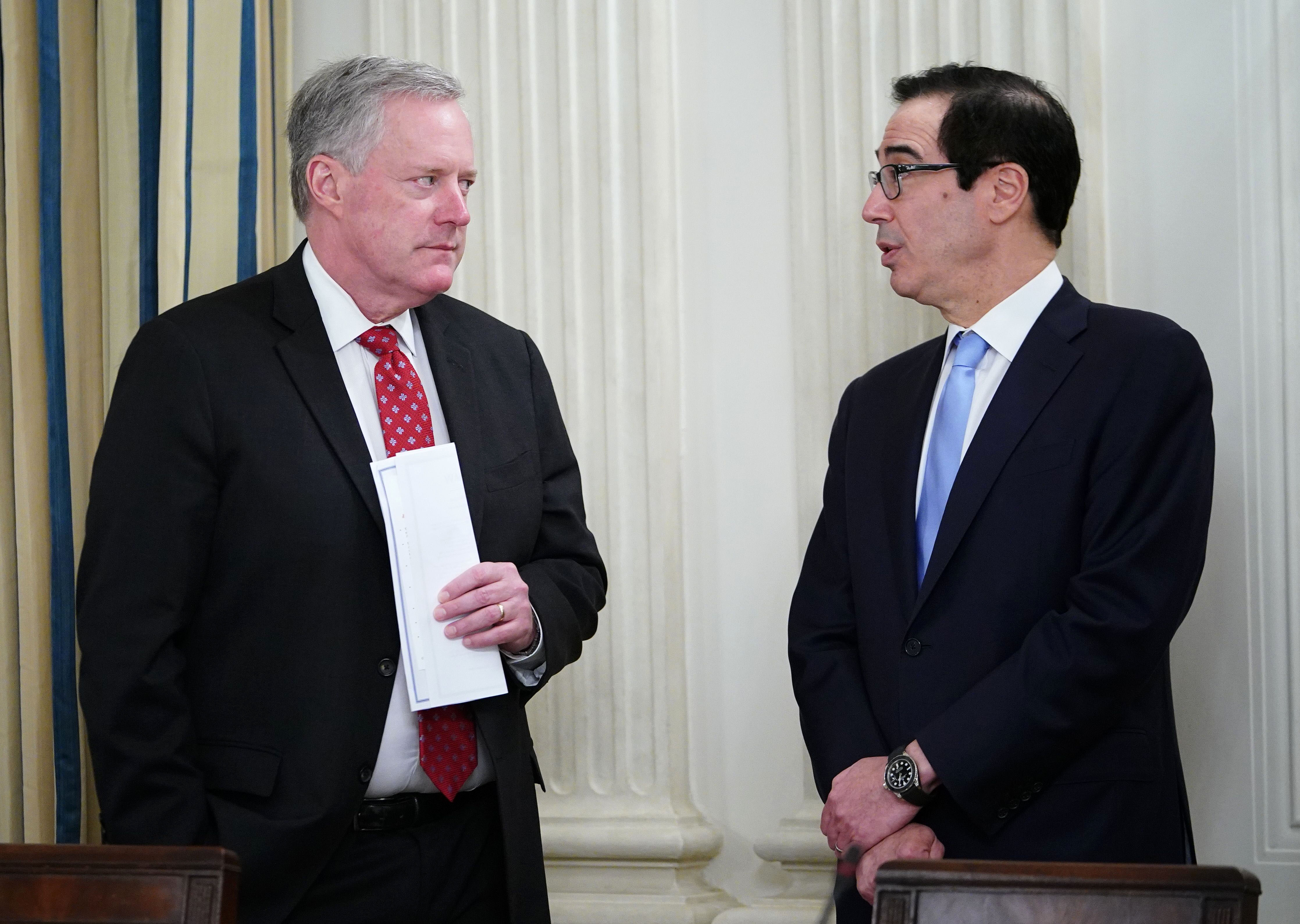 White House Chief of Staff Mark Meadows, left, and Treasury Secretary Steven Mnuchin speak at the White House on May 8.