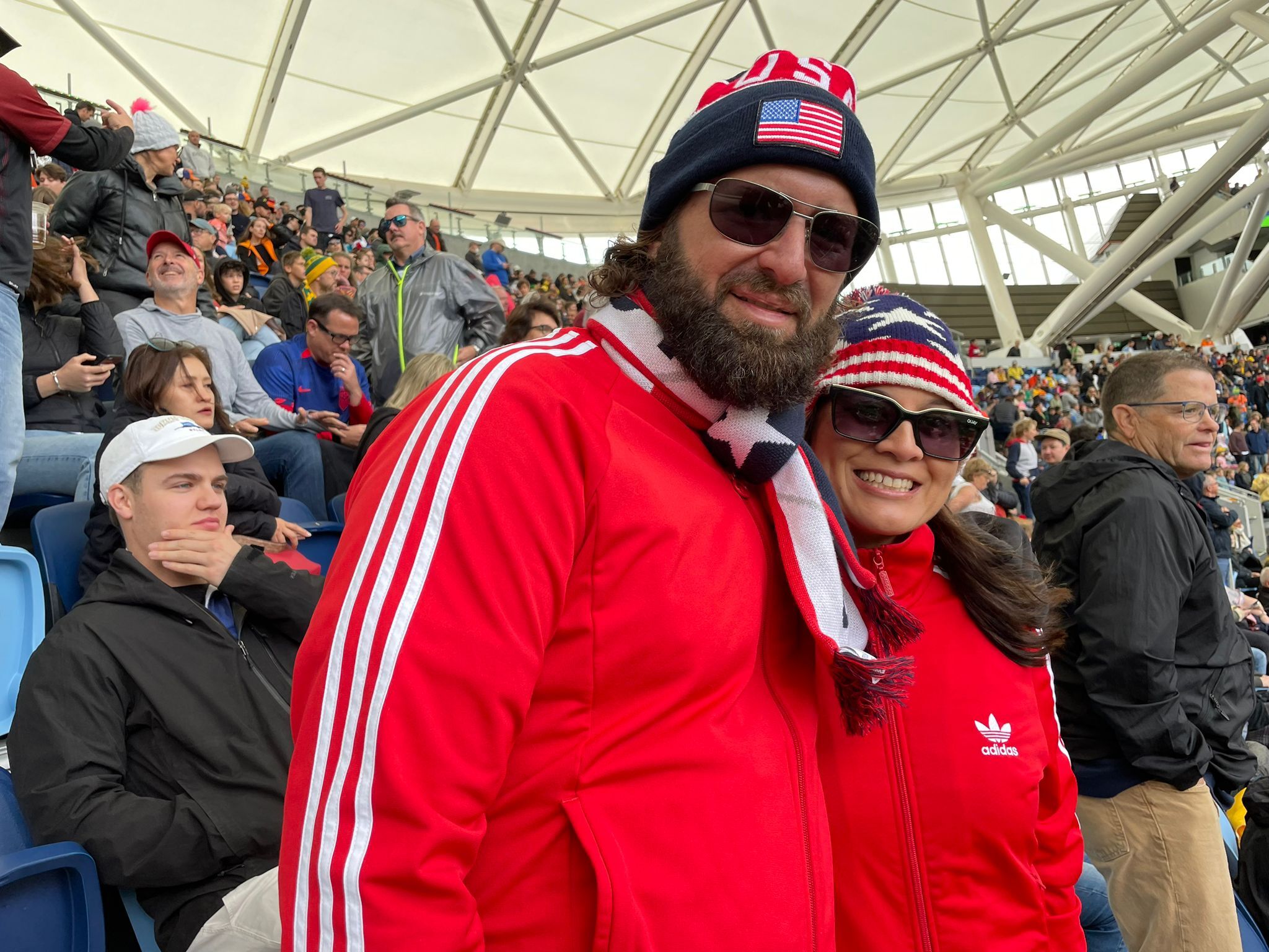 Chris Woolf (left) and Susie Quesada rock their US pride at the Netherlands game earlier on Sunday.