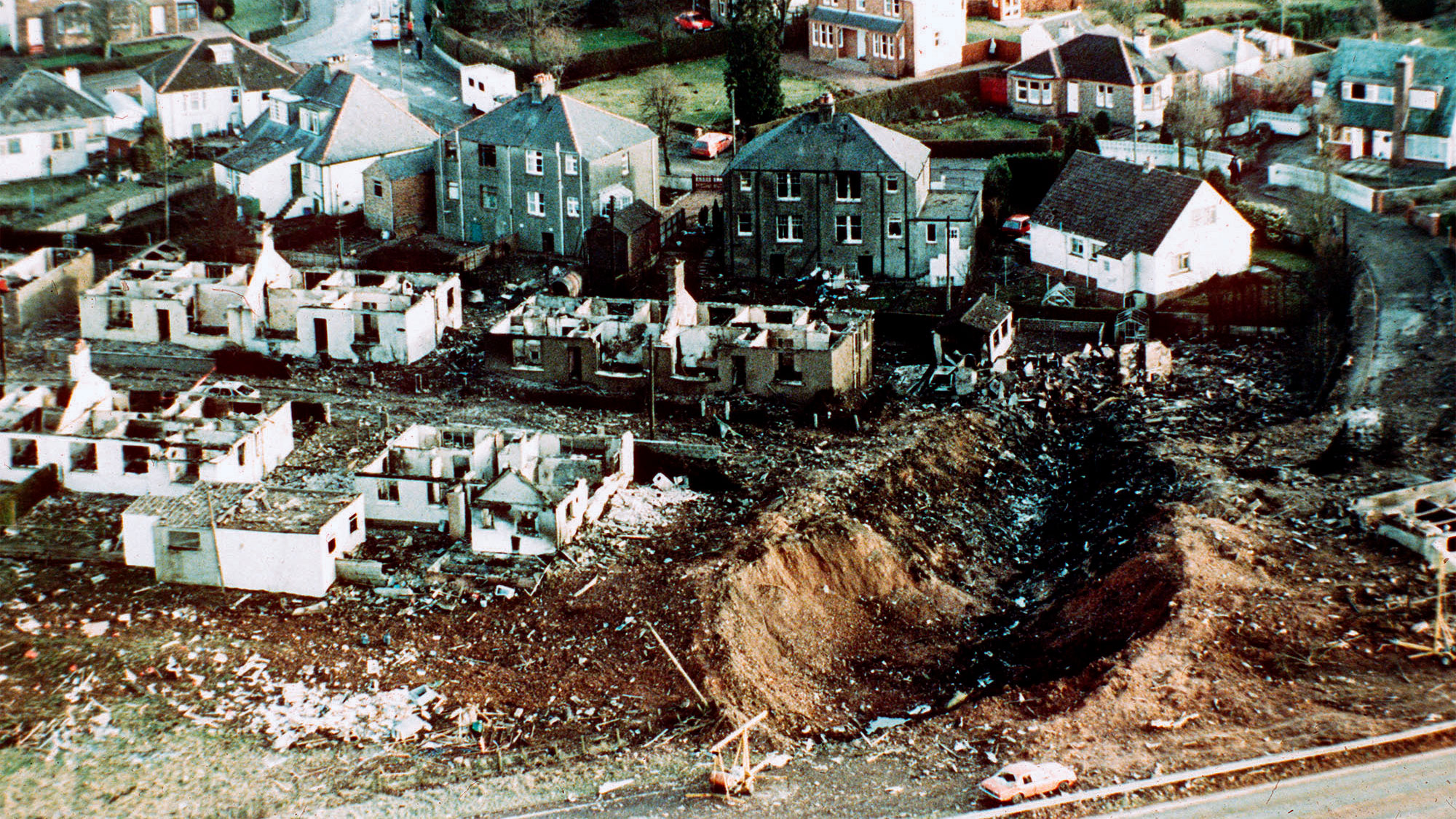 Wrecked houses are seen after the 1988 bombing over Lockerbie, Scotland.