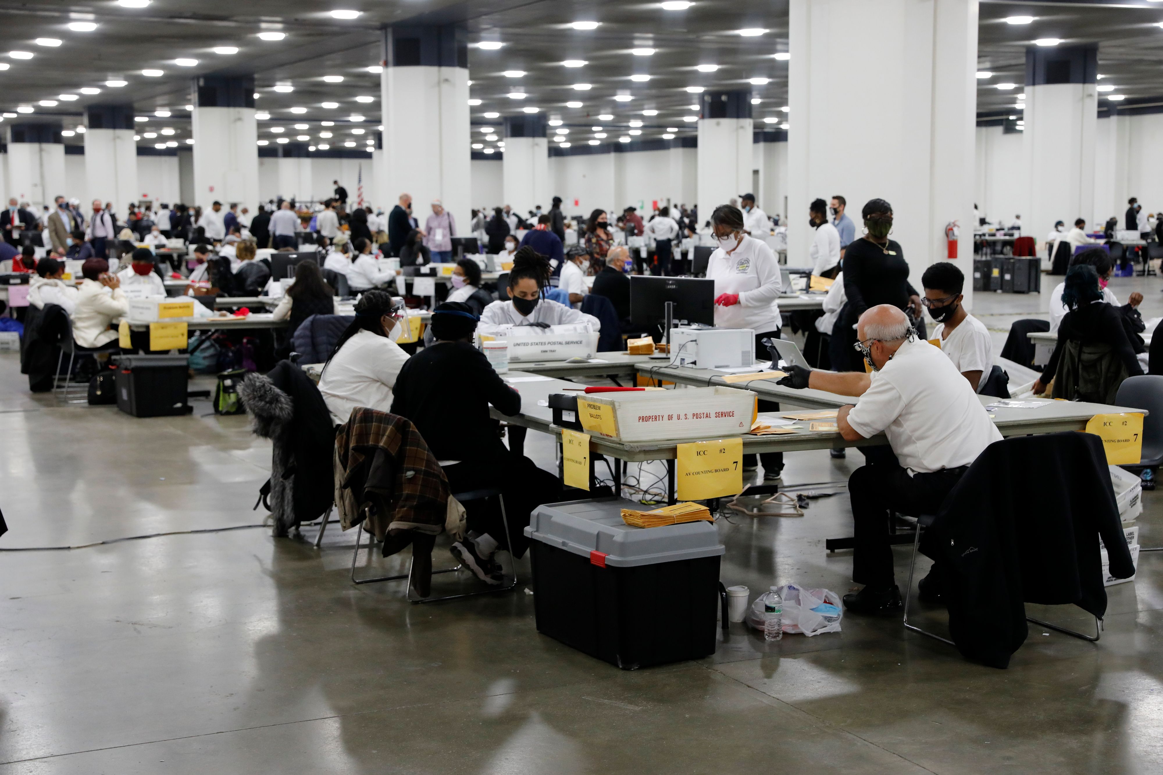 Detroit election workers work on counting absentee ballots at the TCF Center in Detroit, Michigan, on November 4.