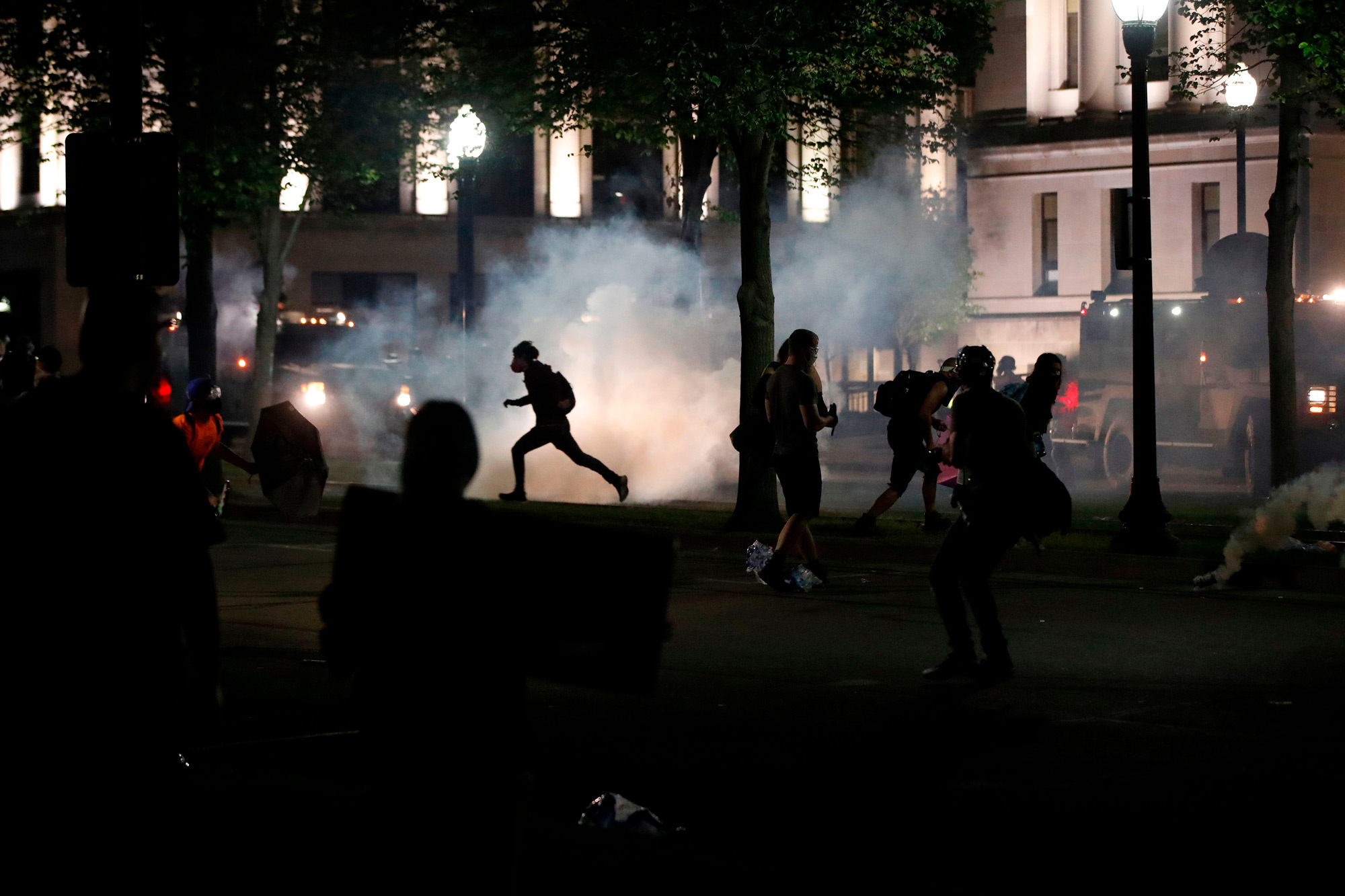 Protesters clash with Kenosha County Sherriff's officers in front of the County Court House during demonstrations against the shooting of Jacob Blake in Kenosha, Wisconsin on August 24.