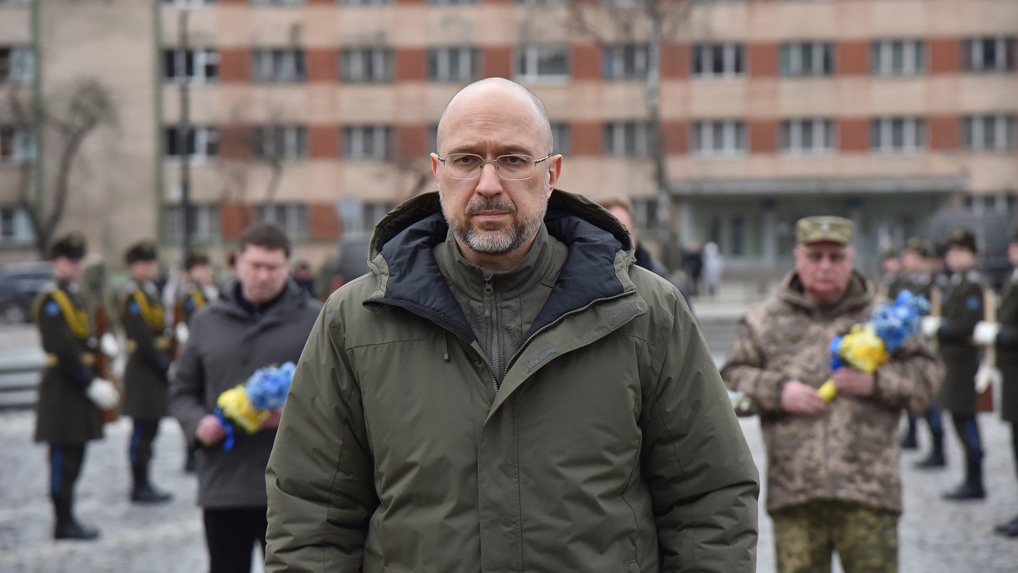 Prime Minister of Ukraine Denys Shmyhal laying flowers at the graves of Ukrainian soldiers at Lychakiv Cemetery in Lviv, Ukraine on February 22.