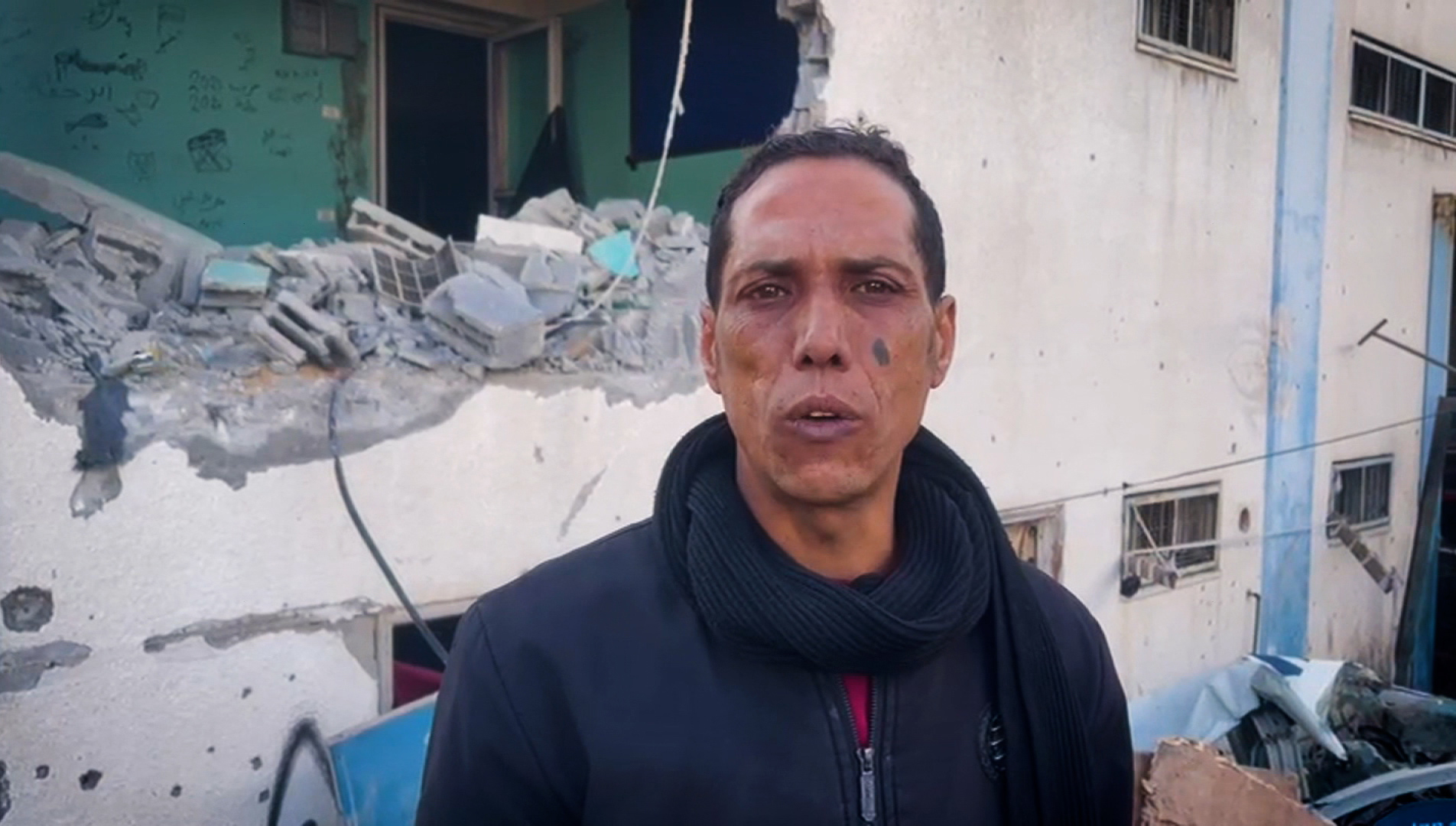 Abdul Kareem Al-Qaseer speaks in Gaza City's Tal El Hawa neighborhood on February 10.