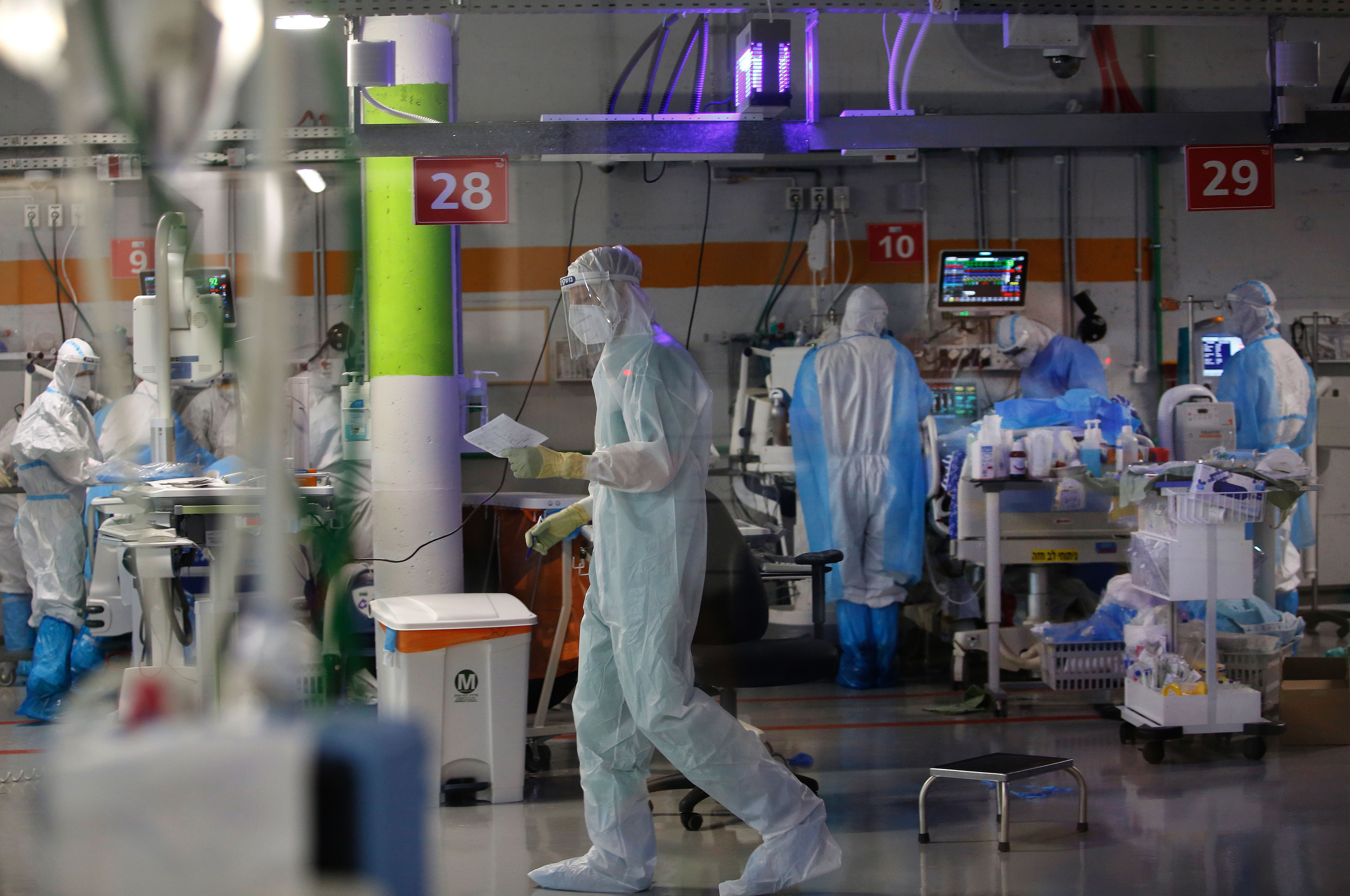 Medical staff work in the Covid-19 isolation ward of Sheba Medical Center in Ramat Gan, Israel, on June 30.