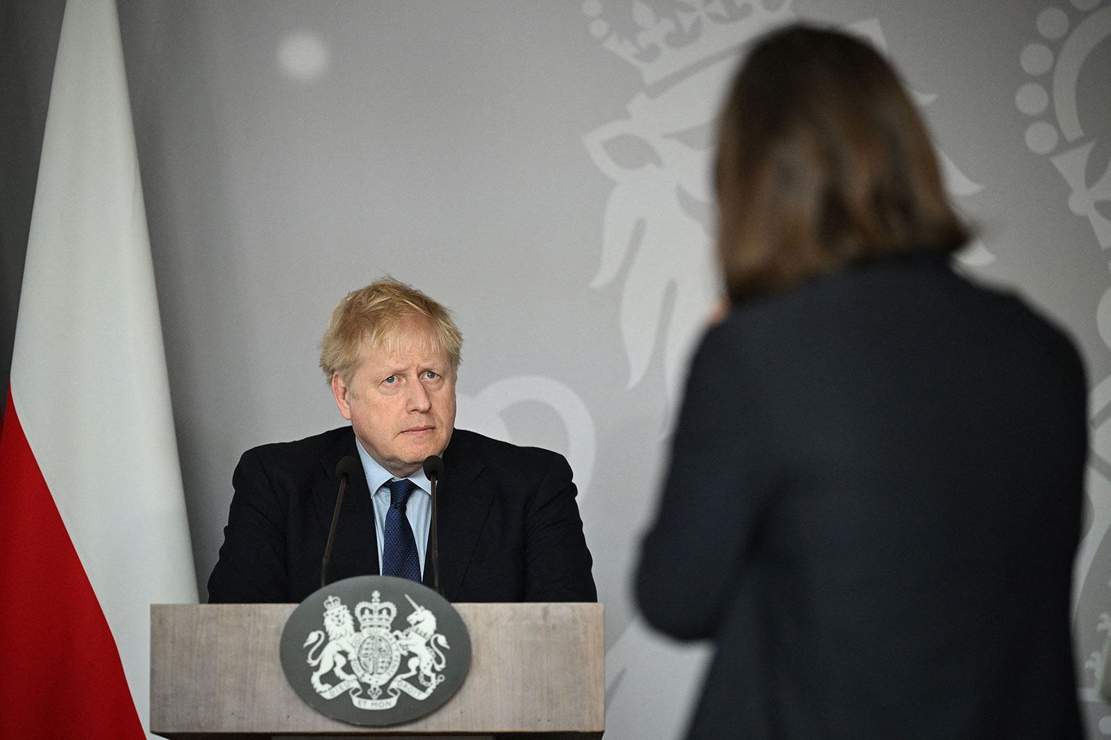 UK Prime Minister Boris Johnson takes questions during a press conference in Warsaw, Poland, on March 1.