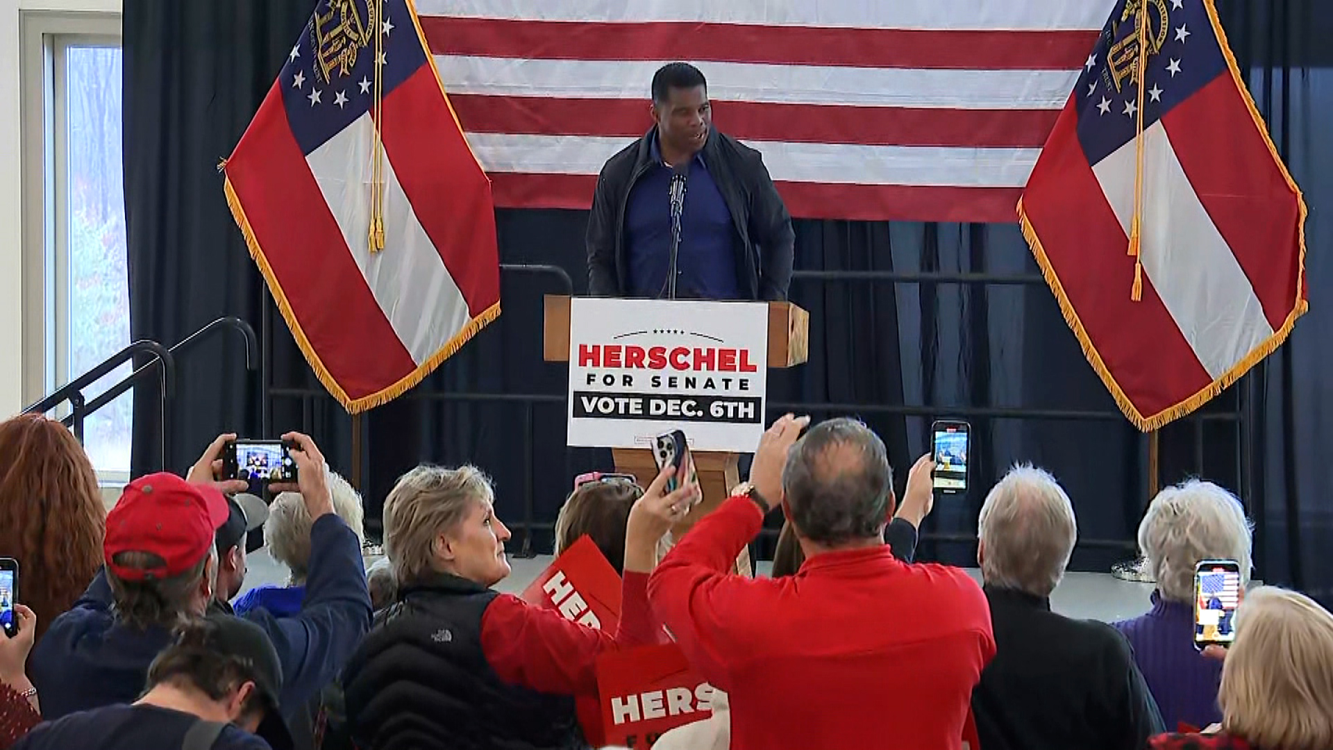 Herschel Walker speaks at a campaign stop in Ellijay, Georgia, on Monday.