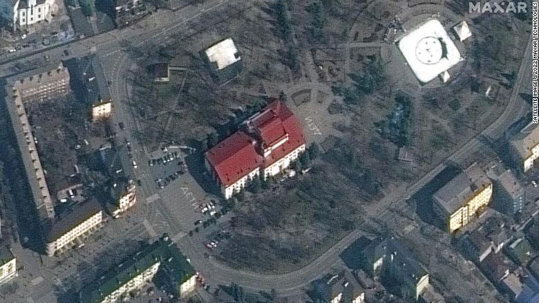 Satellite images from Maxar Technologies show that on Monday, the word "children" was spelled out in Russian in two areas outside the theater that was bombed on Wednesday.