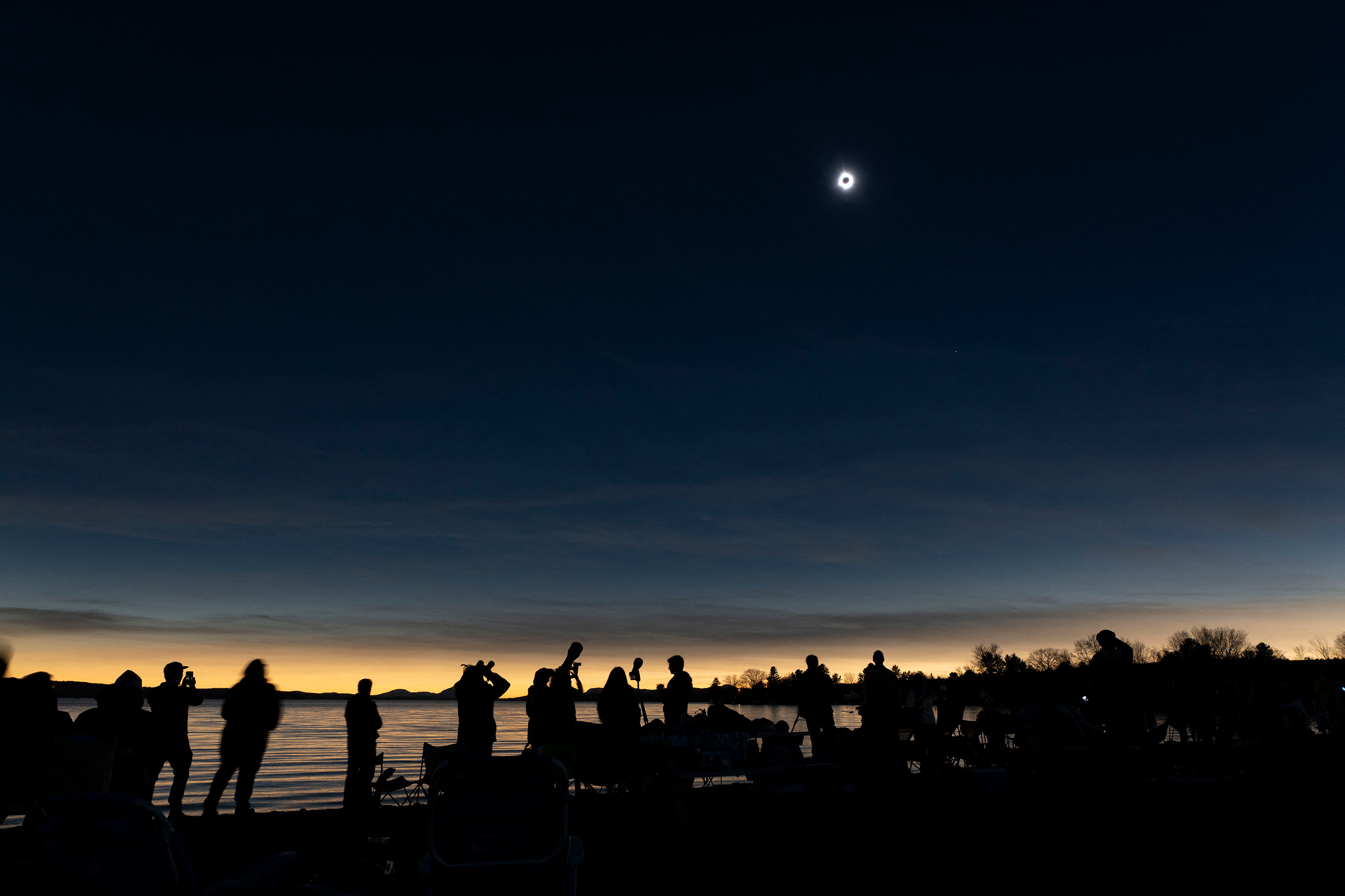 The moon covers the sun during the eclipse in Magog, Quebec.