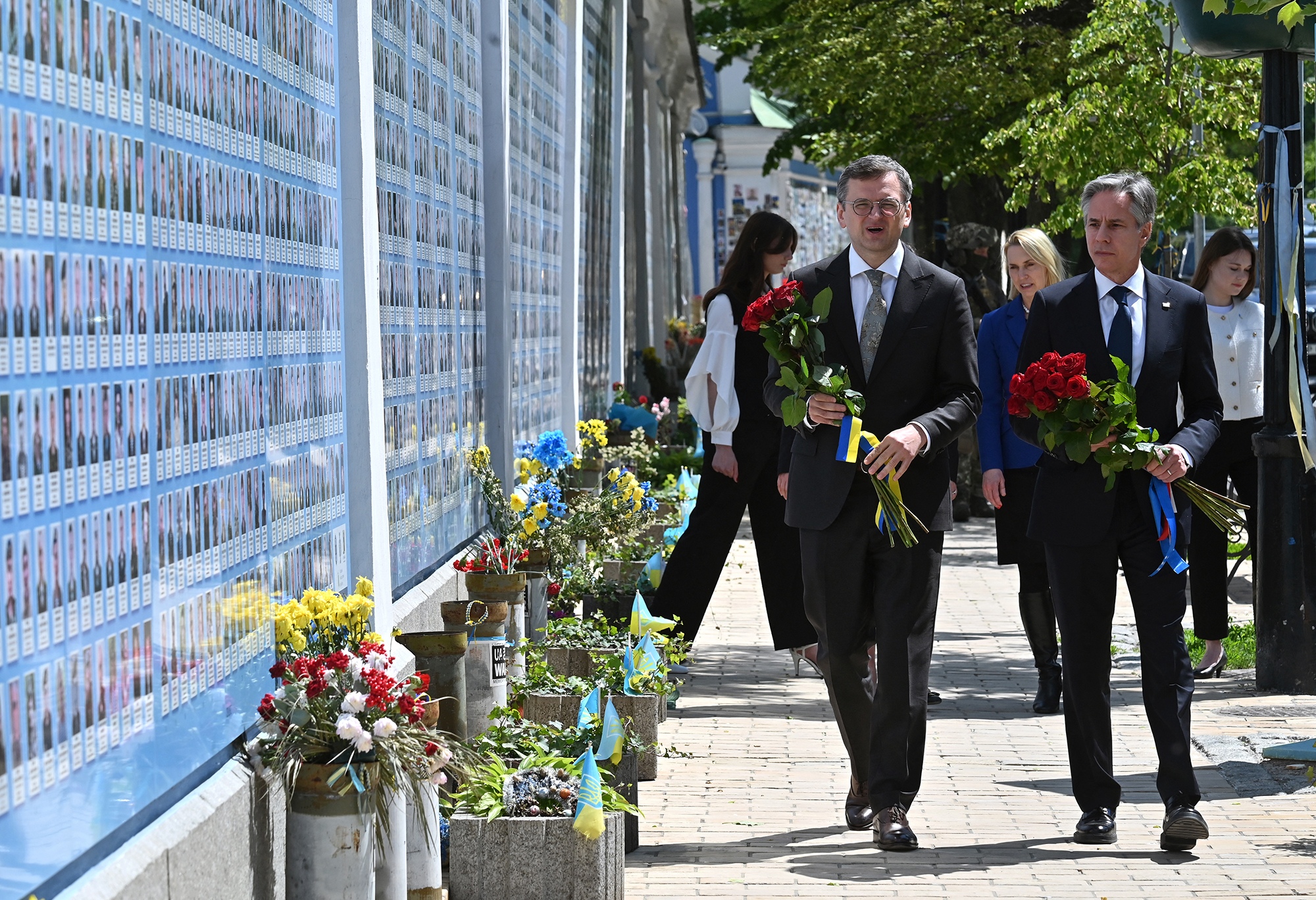 US Secretary of State Antony Blinken, right, and his Ukrainian counterpart Dmytro Kuleba walk along the Memory Wall of Fallen Defenders of Ukraine in the Russian-Ukrainian War, in Kyiv, Ukriane, on May 15.
