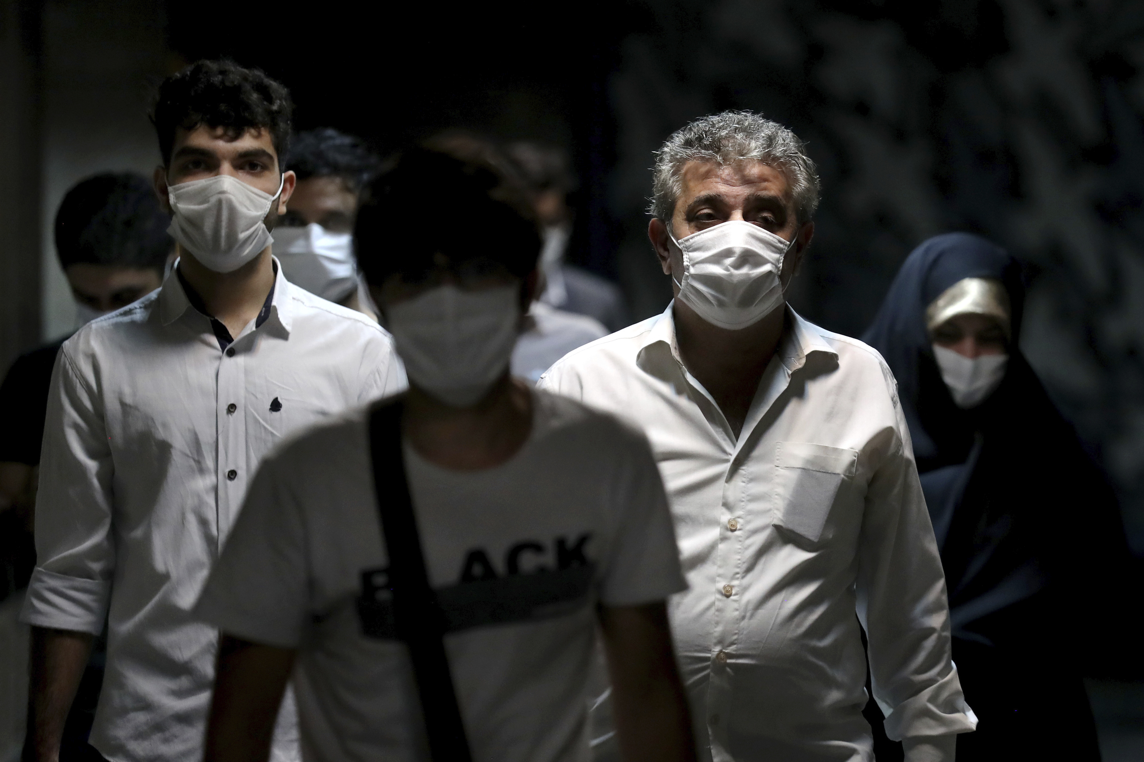 People walk in a metro station in Tehran, Iran, on July 8.