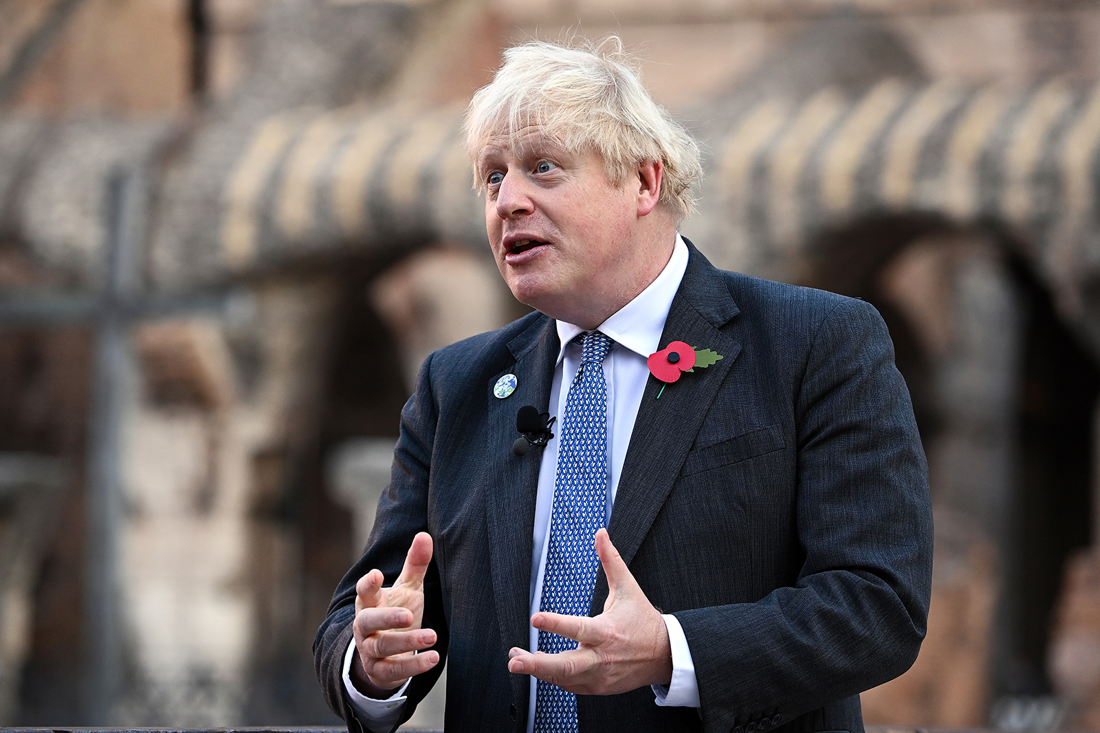 British Prime Minister Boris Johnson, visits the Colosseum during the G20 summit on October 30, in Rome.