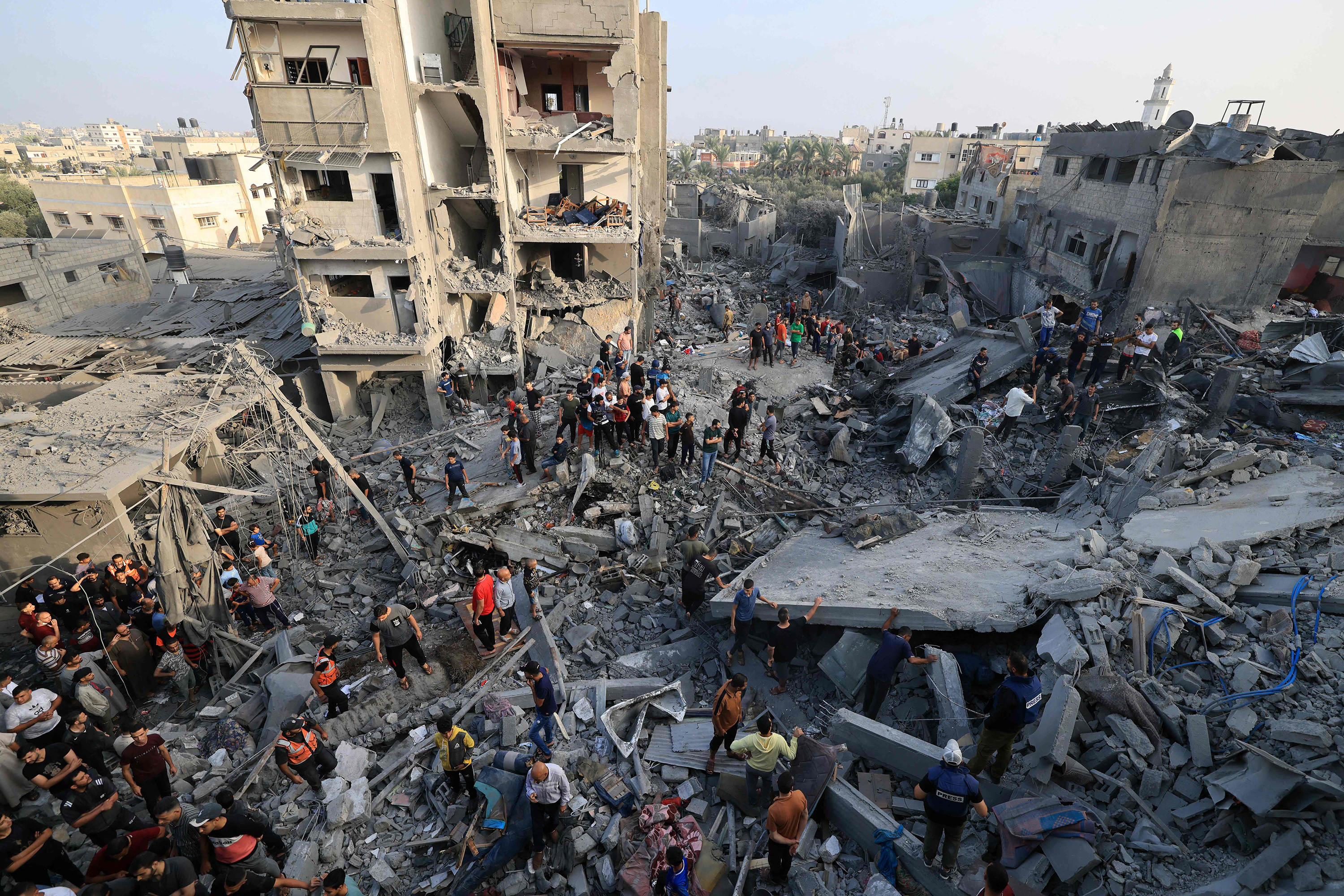 People check the damage at the Al-Maghazi refugee camp in Deir Balah in the central Gaza Strip, on November 5.