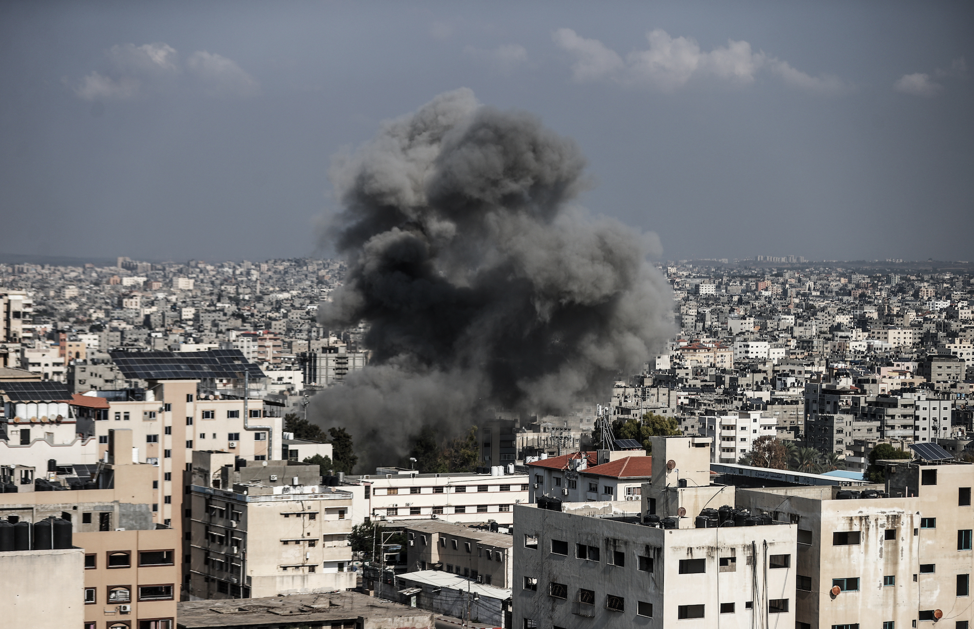 Black smoke rises after an Israeli airstrike in Gaza on Saturday.
